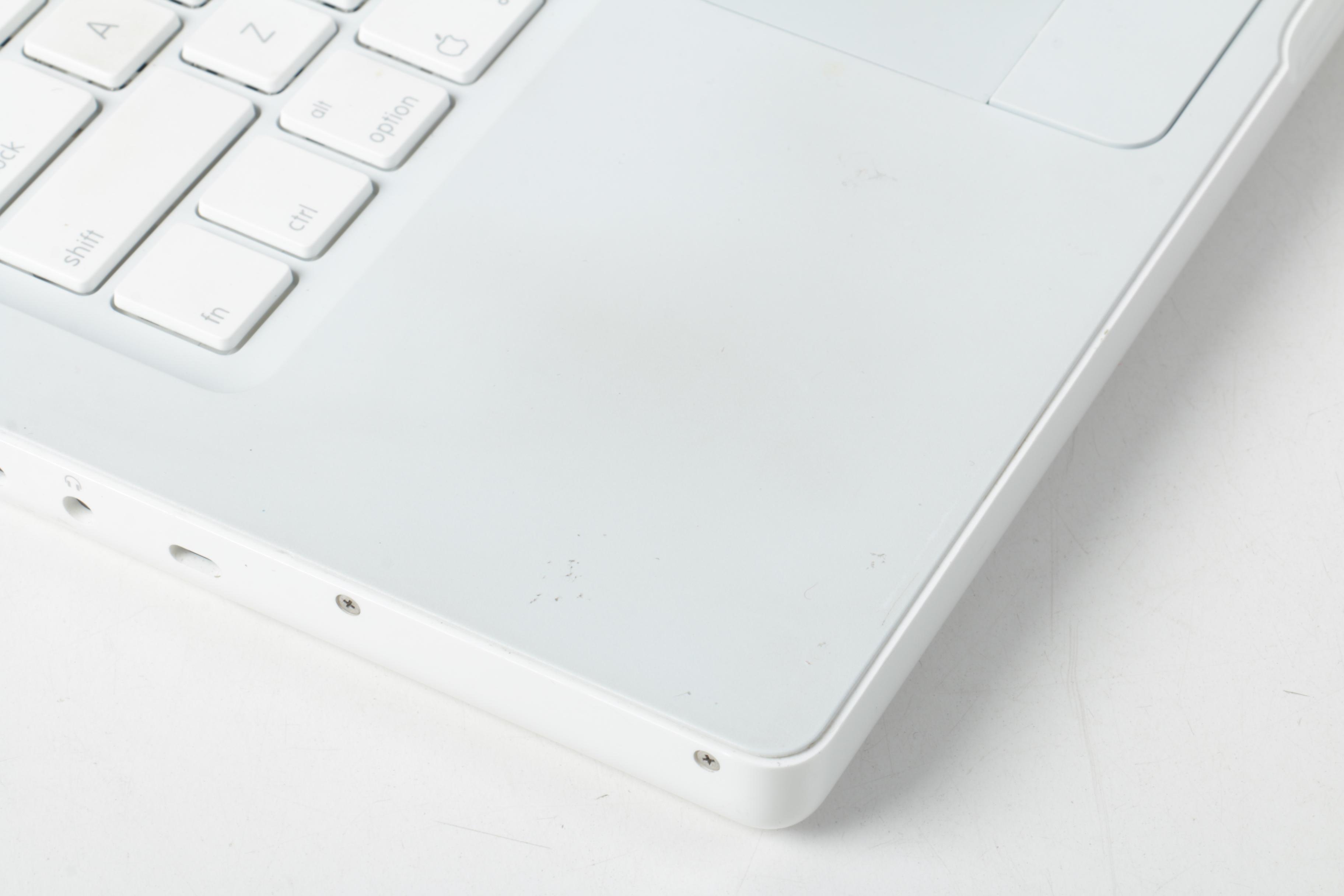 Apple "MacBook" Model "A1181"Laptop Computer And Powerstrip