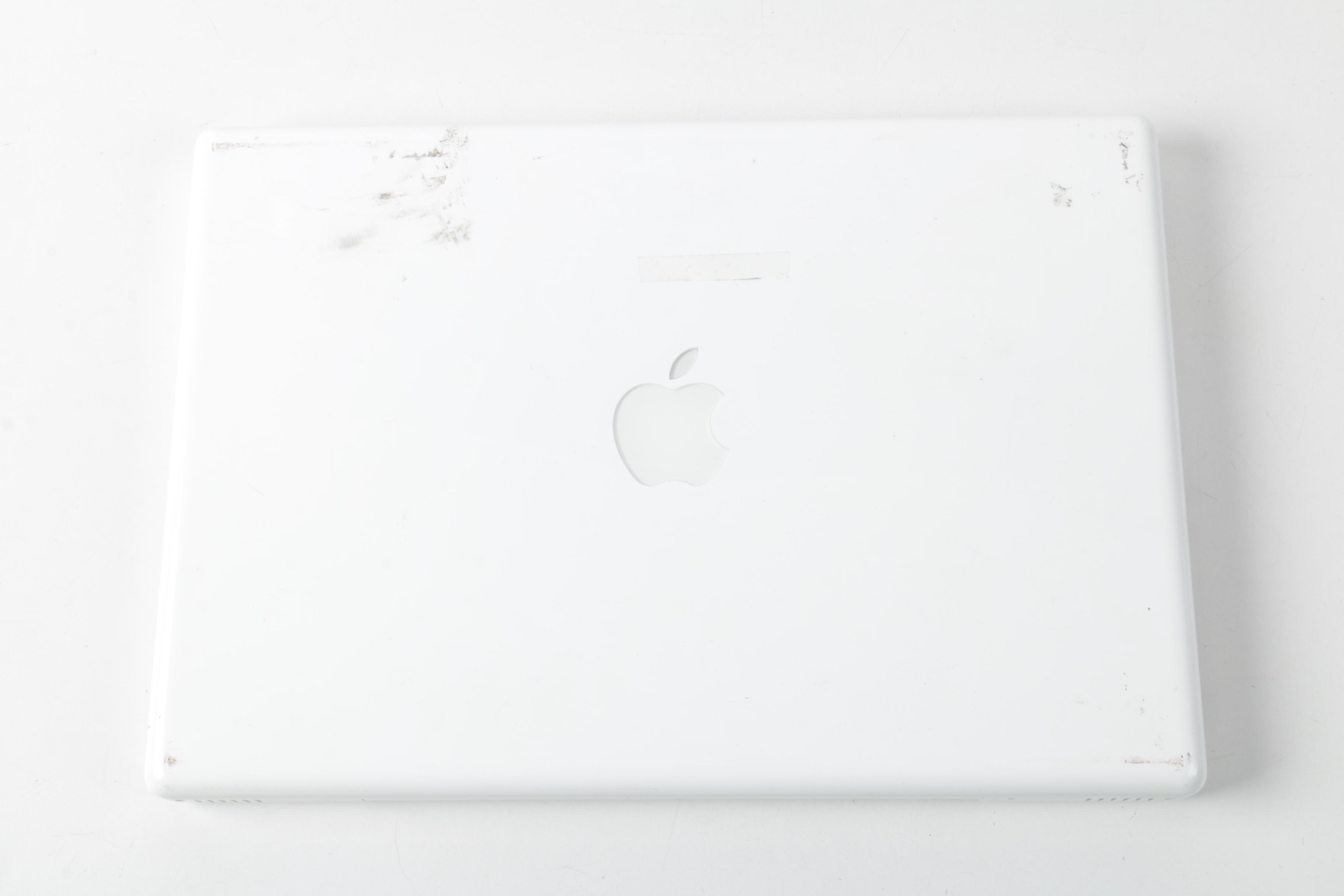 Apple "MacBook" Model "A1181"Laptop Computer And Powerstrip