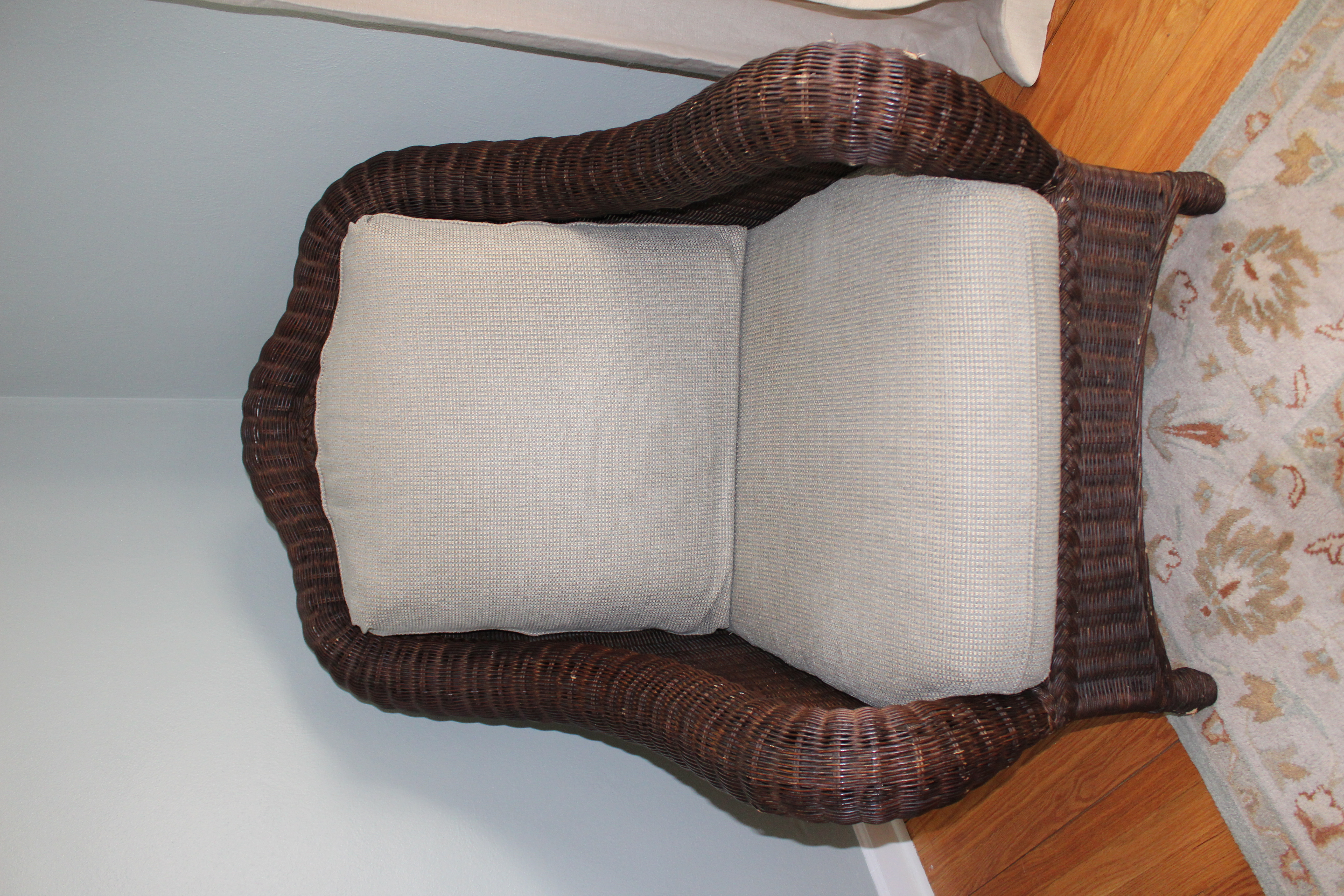 Wicker Chair and Ottoman by Ethan Allen