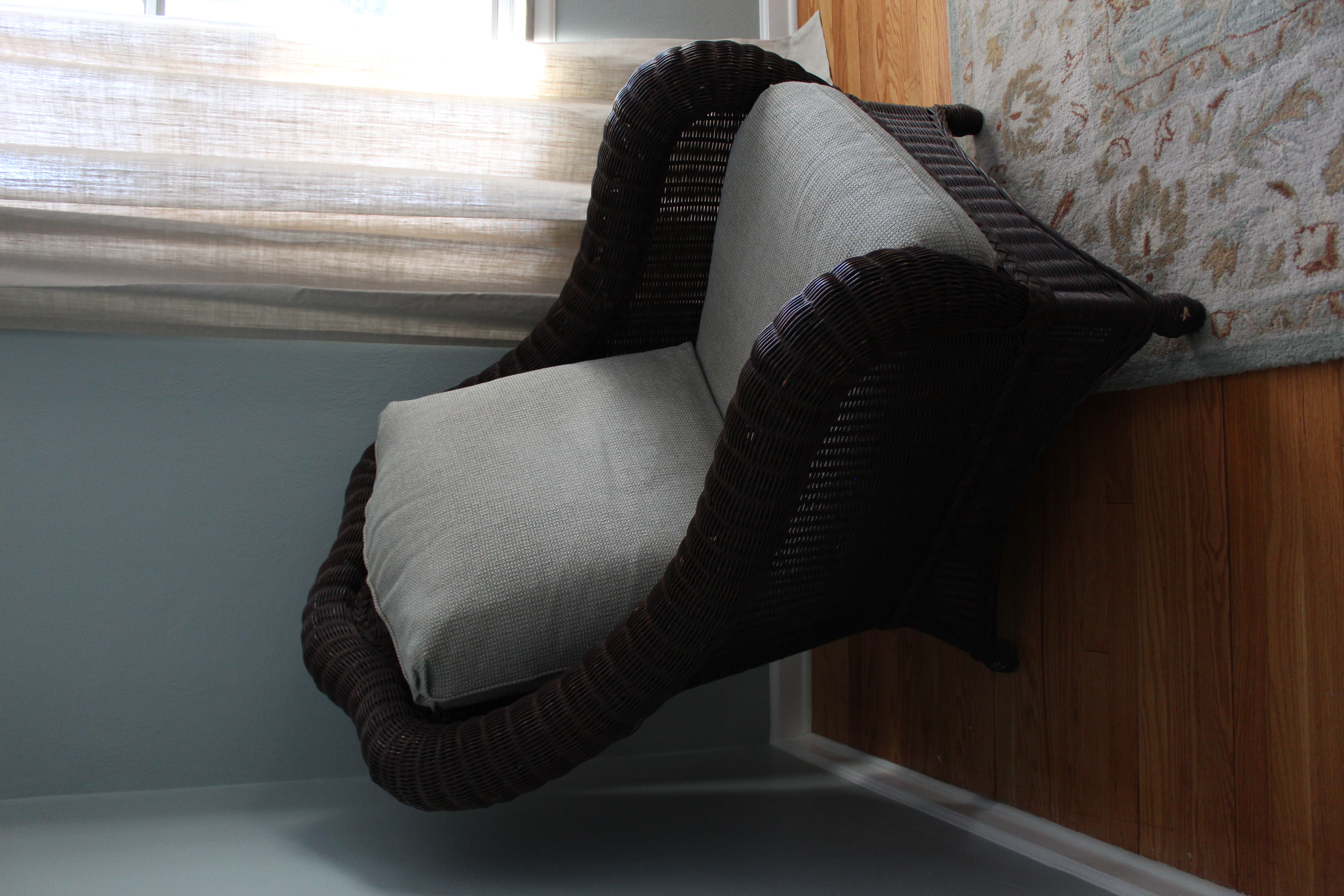 Wicker Chair and Ottoman by Ethan Allen