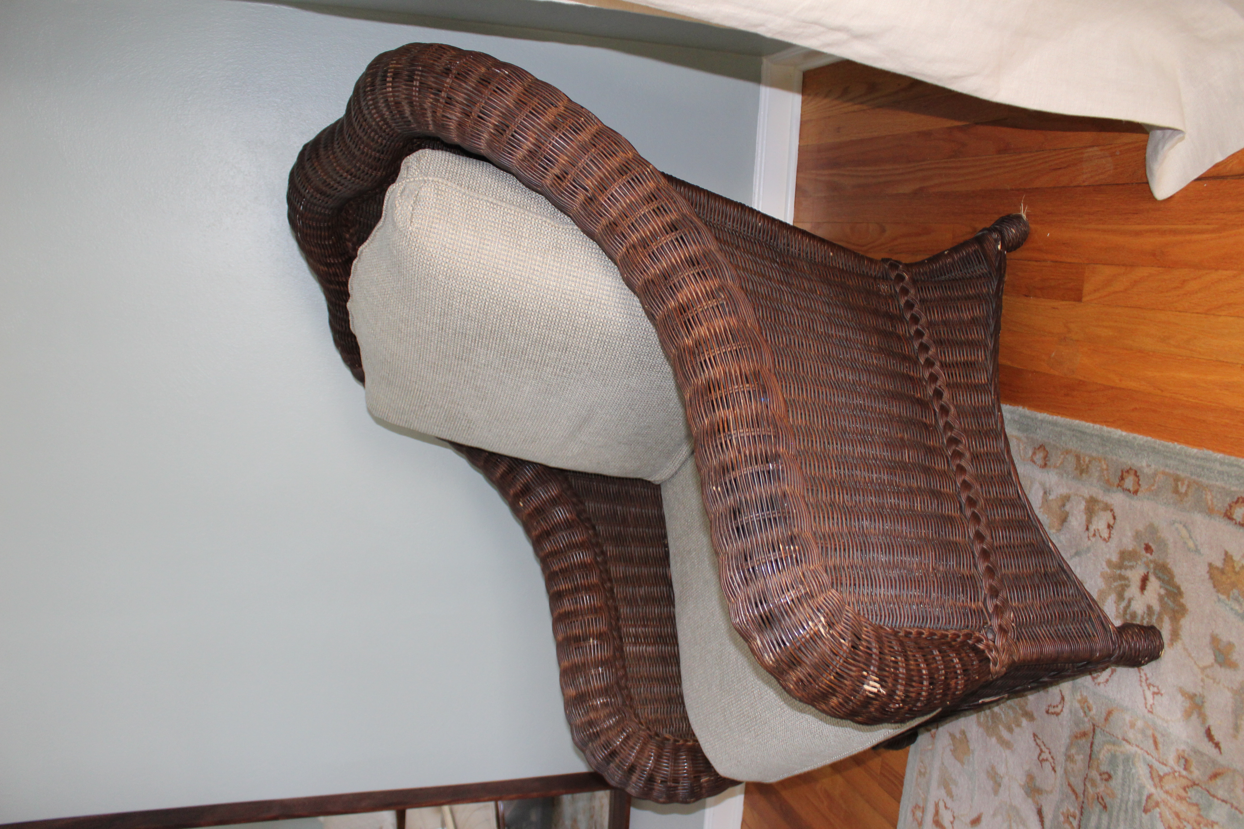 Wicker Chair and Ottoman by Ethan Allen