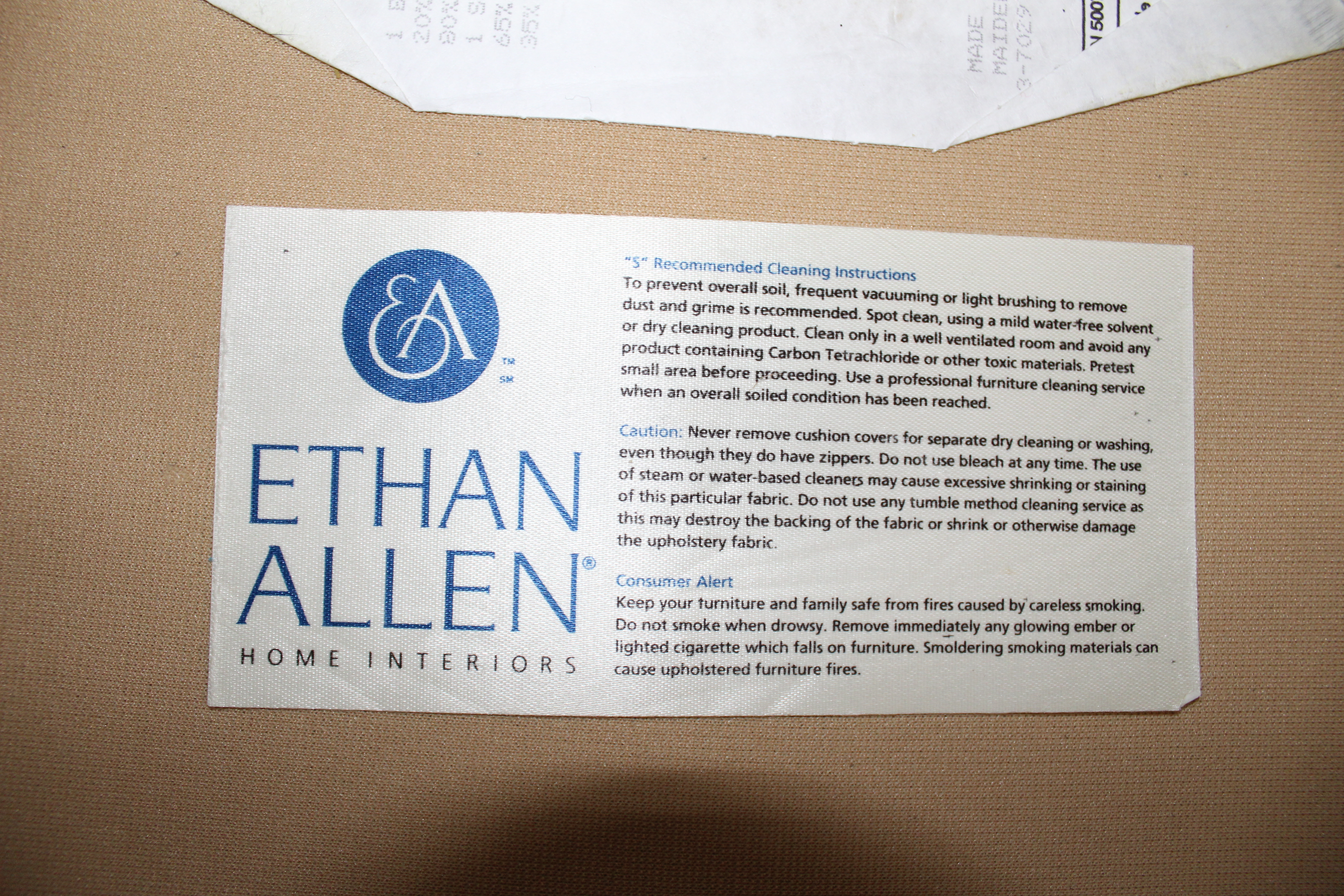 Wicker Chair and Ottoman by Ethan Allen