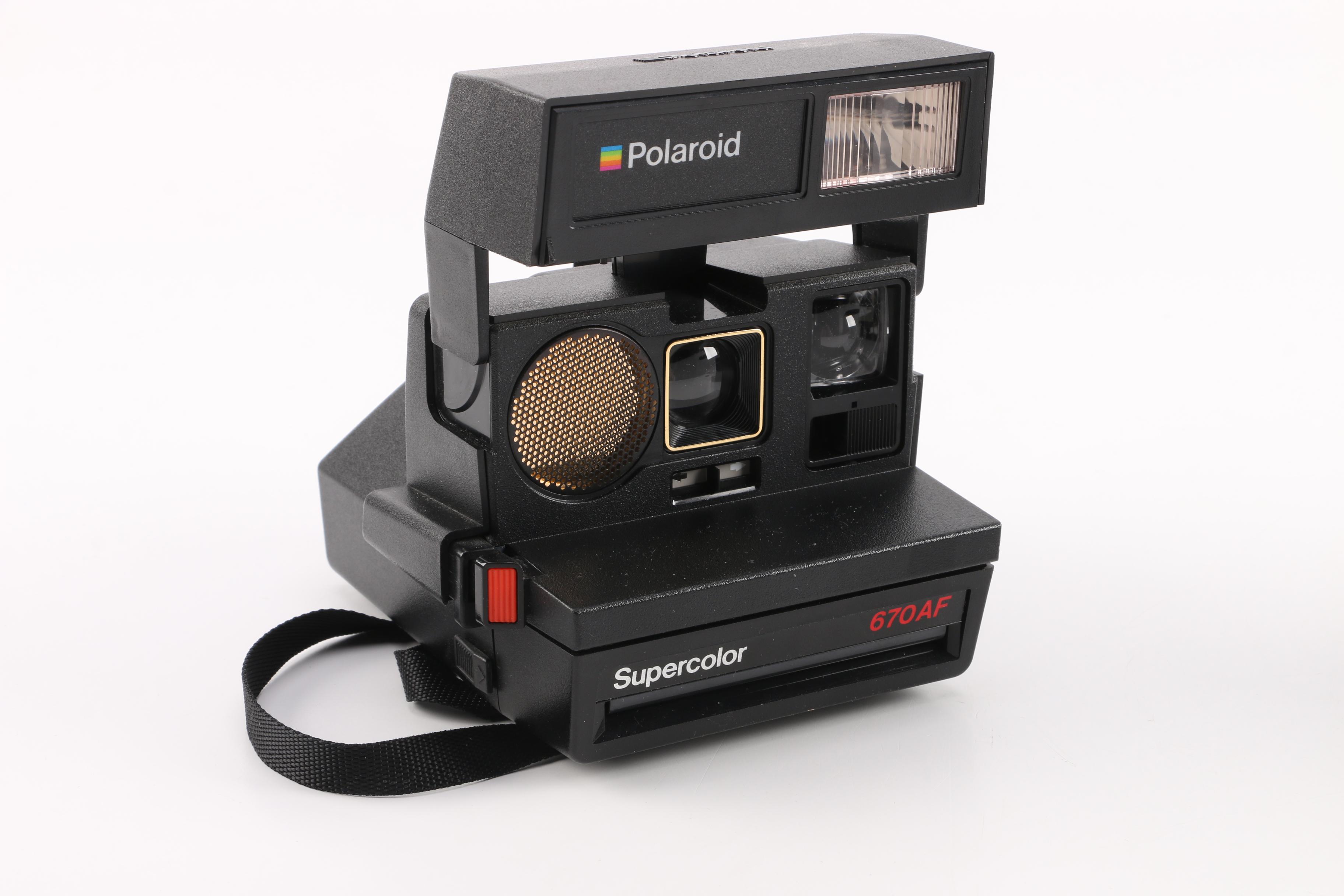 Vintage Polaroid Instant Film Cameras with Film