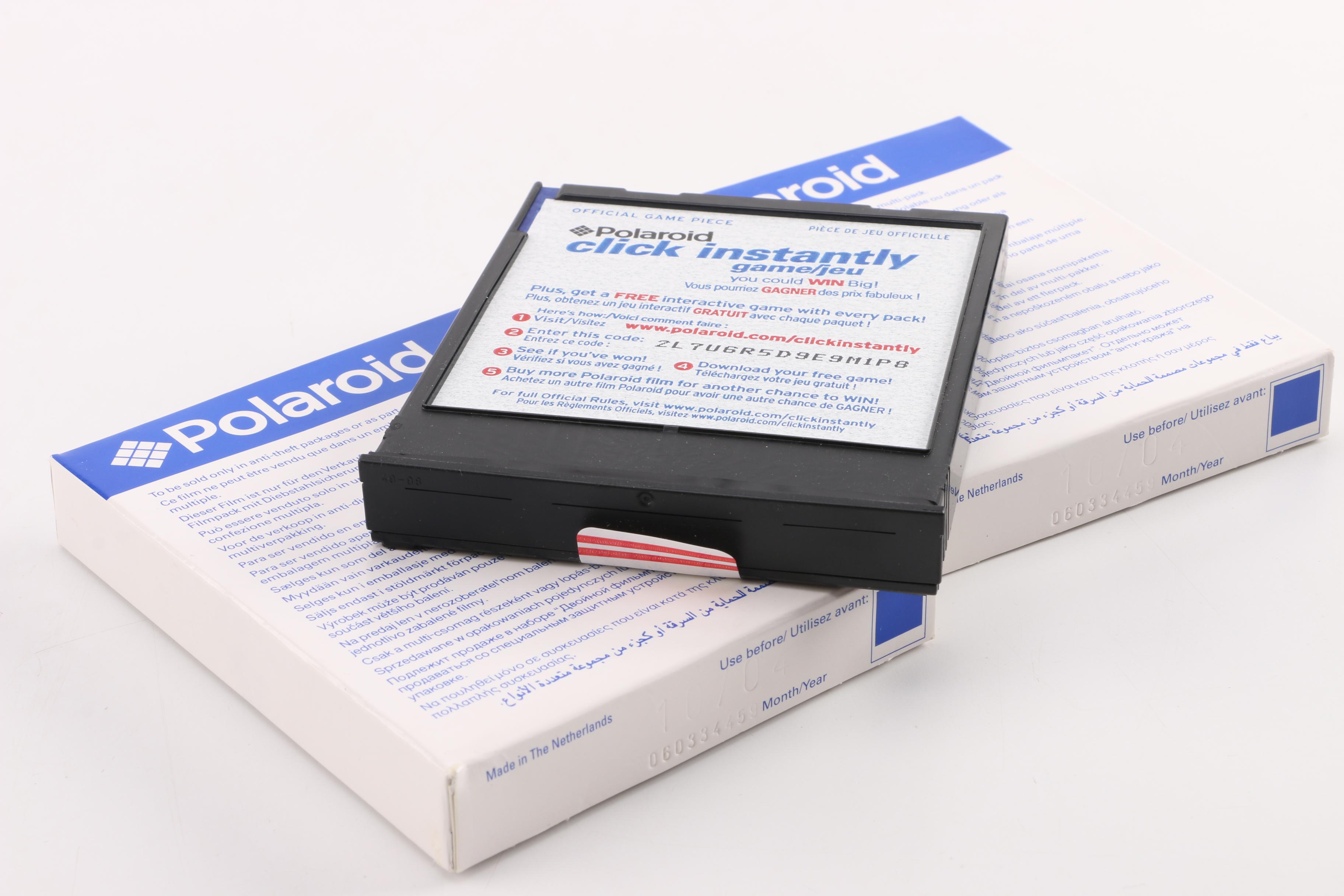 Vintage Polaroid Instant Film Cameras with Film