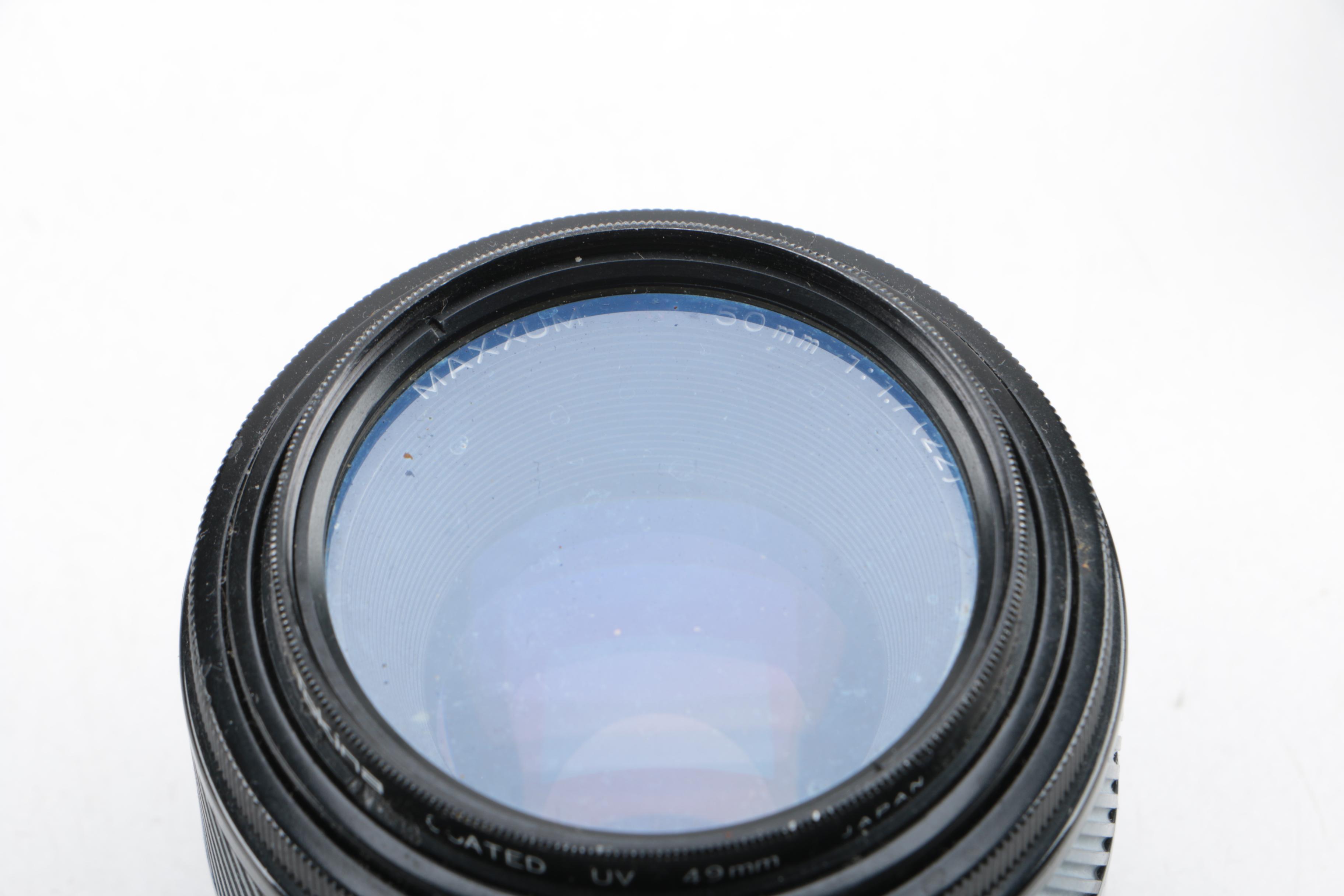 Vintage Minolta Maxxum 7000 SLR Camera with Case and Accessories