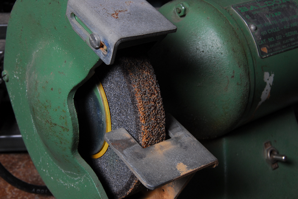 Baldor Grinder Buffer, Dremel Multi-Purpose Tool, and Delta Band Saw