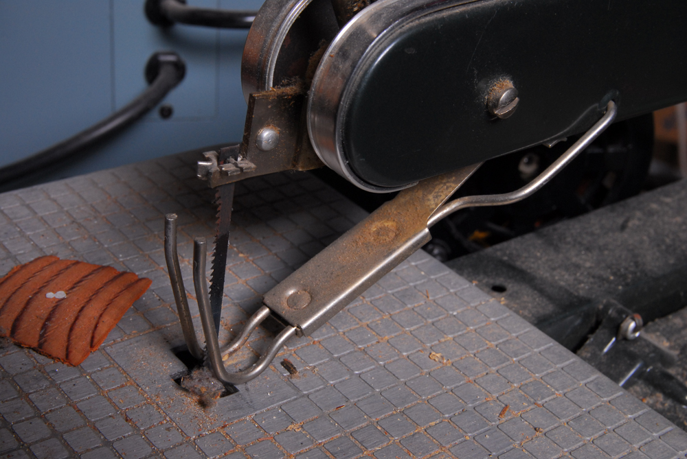 Baldor Grinder Buffer, Dremel Multi-Purpose Tool, and Delta Band Saw