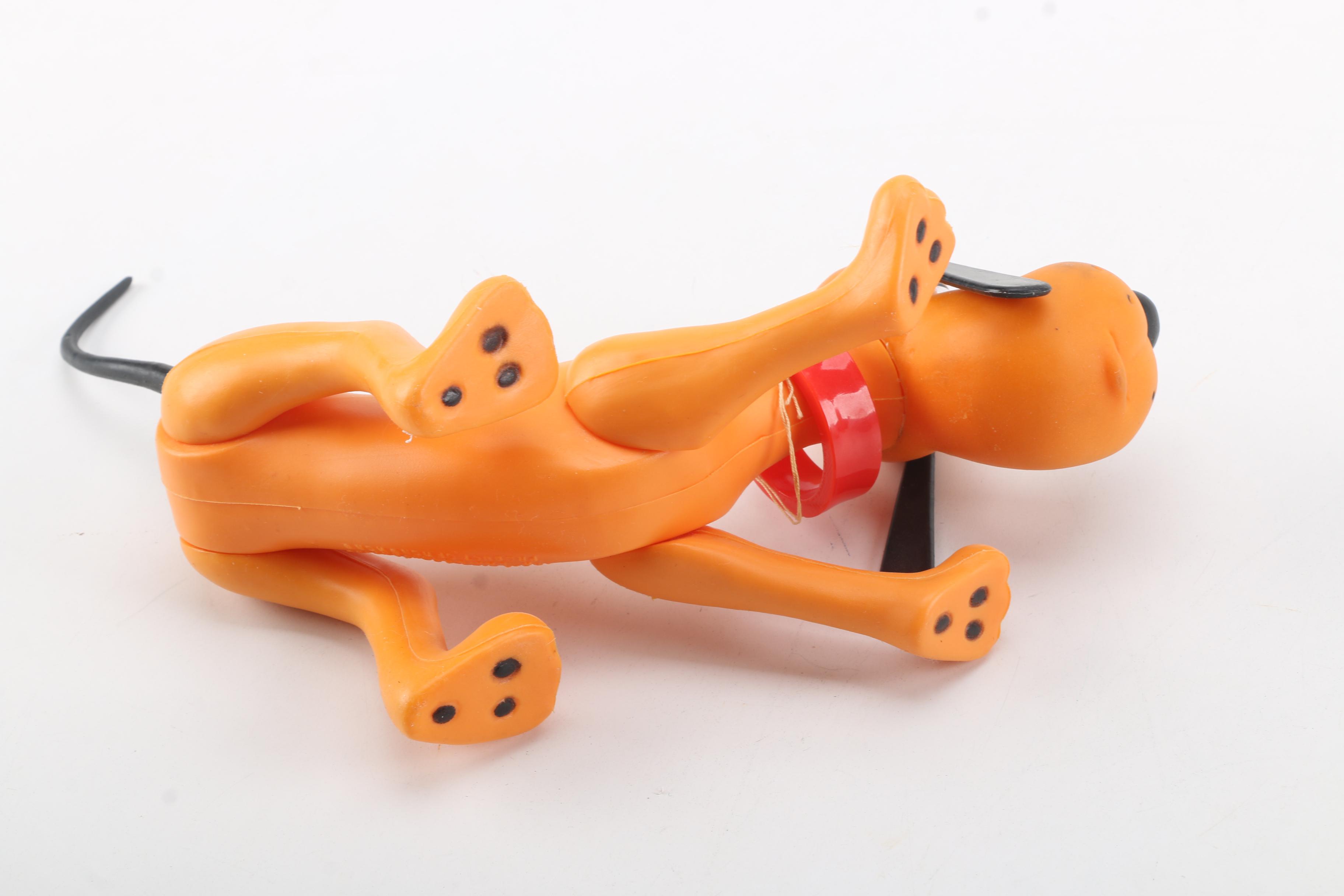 Vintage Jointed Vinyl Pluto