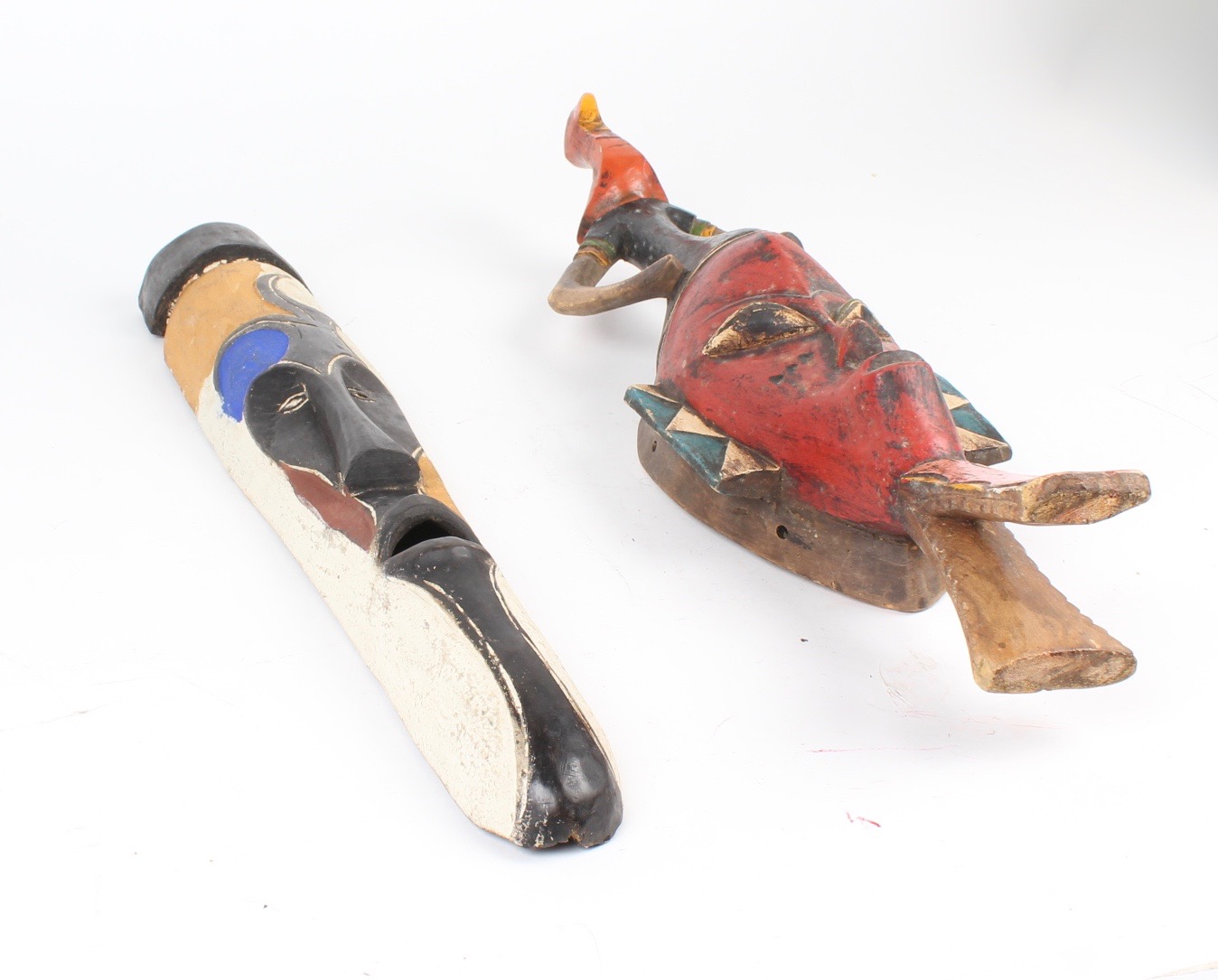 Colorful West African Fang Mask and Ivory Coast Guro Spirit Mask