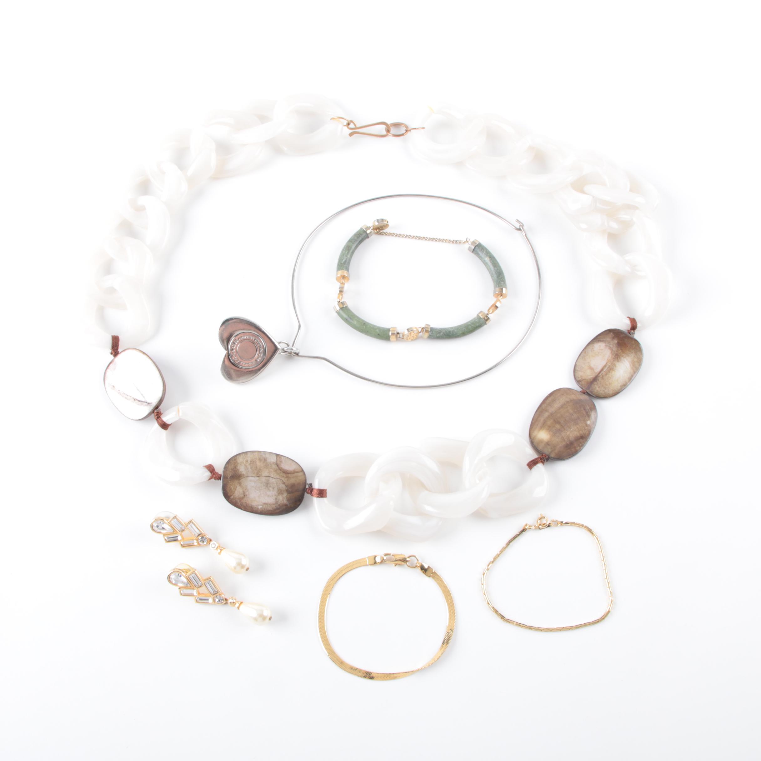 Collection of Costume Jewelry Featuring Coach Necklace and Swarovski Earrings