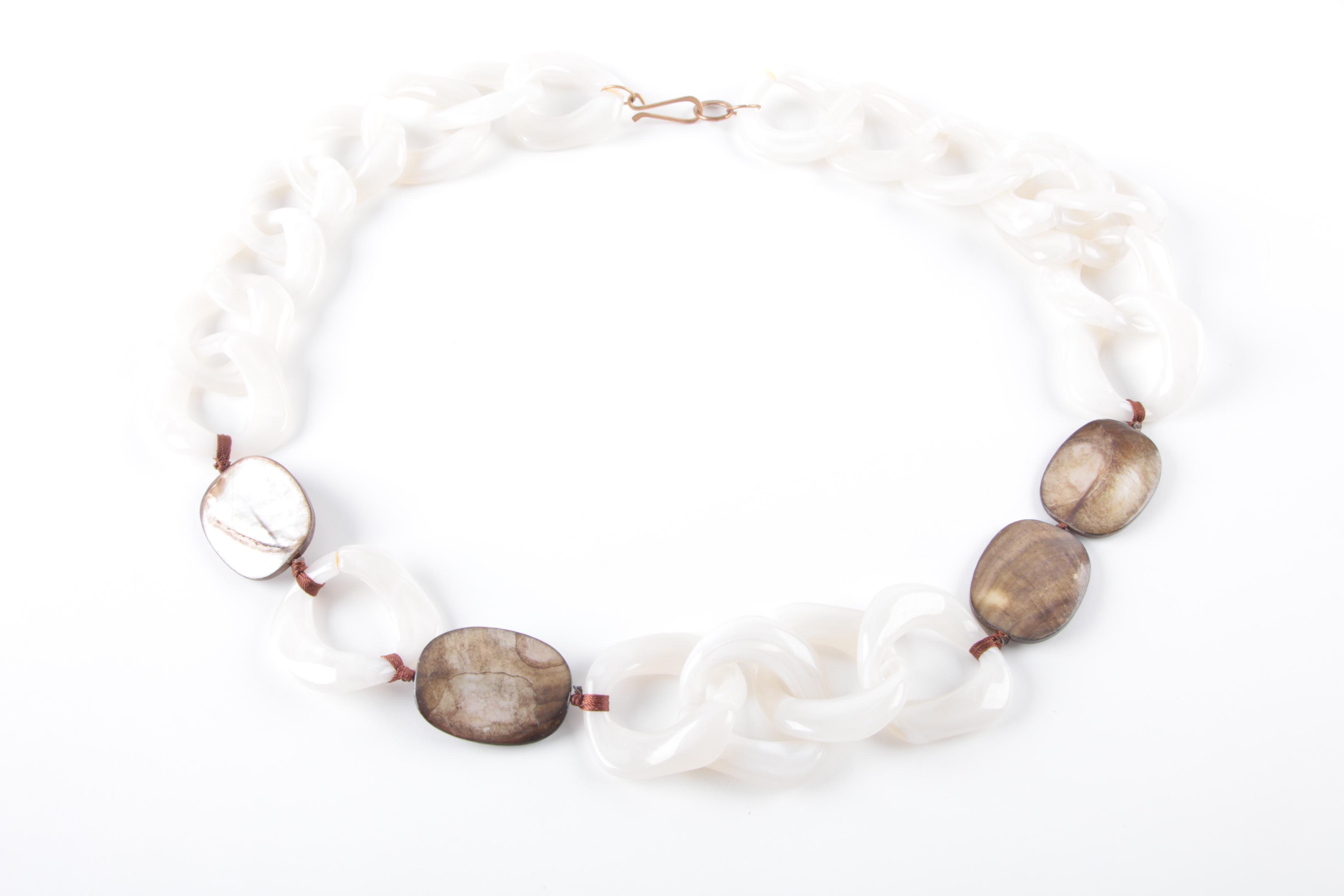 Collection of Costume Jewelry Featuring Coach Necklace and Swarovski Earrings