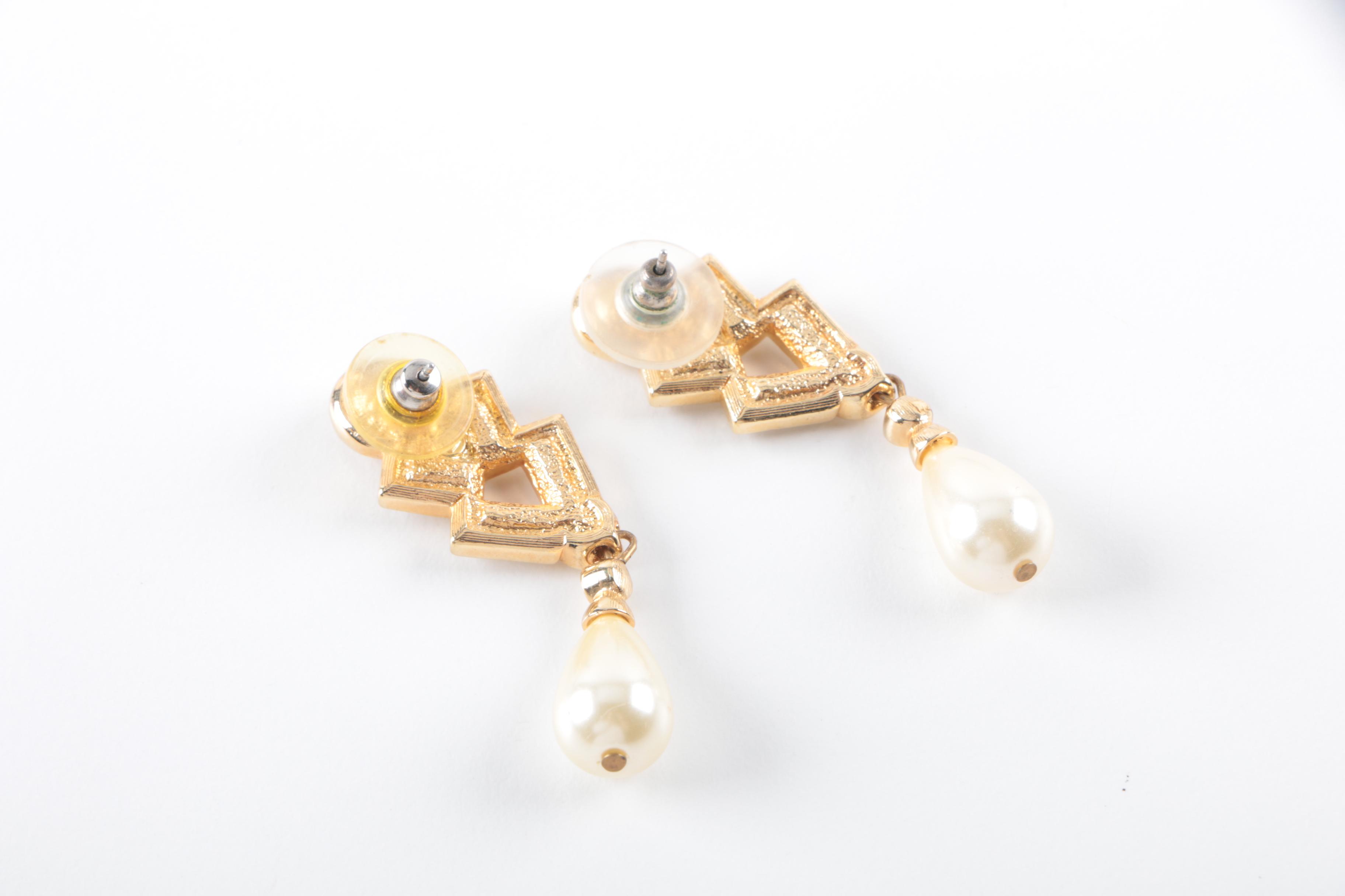 Collection of Costume Jewelry Featuring Coach Necklace and Swarovski Earrings