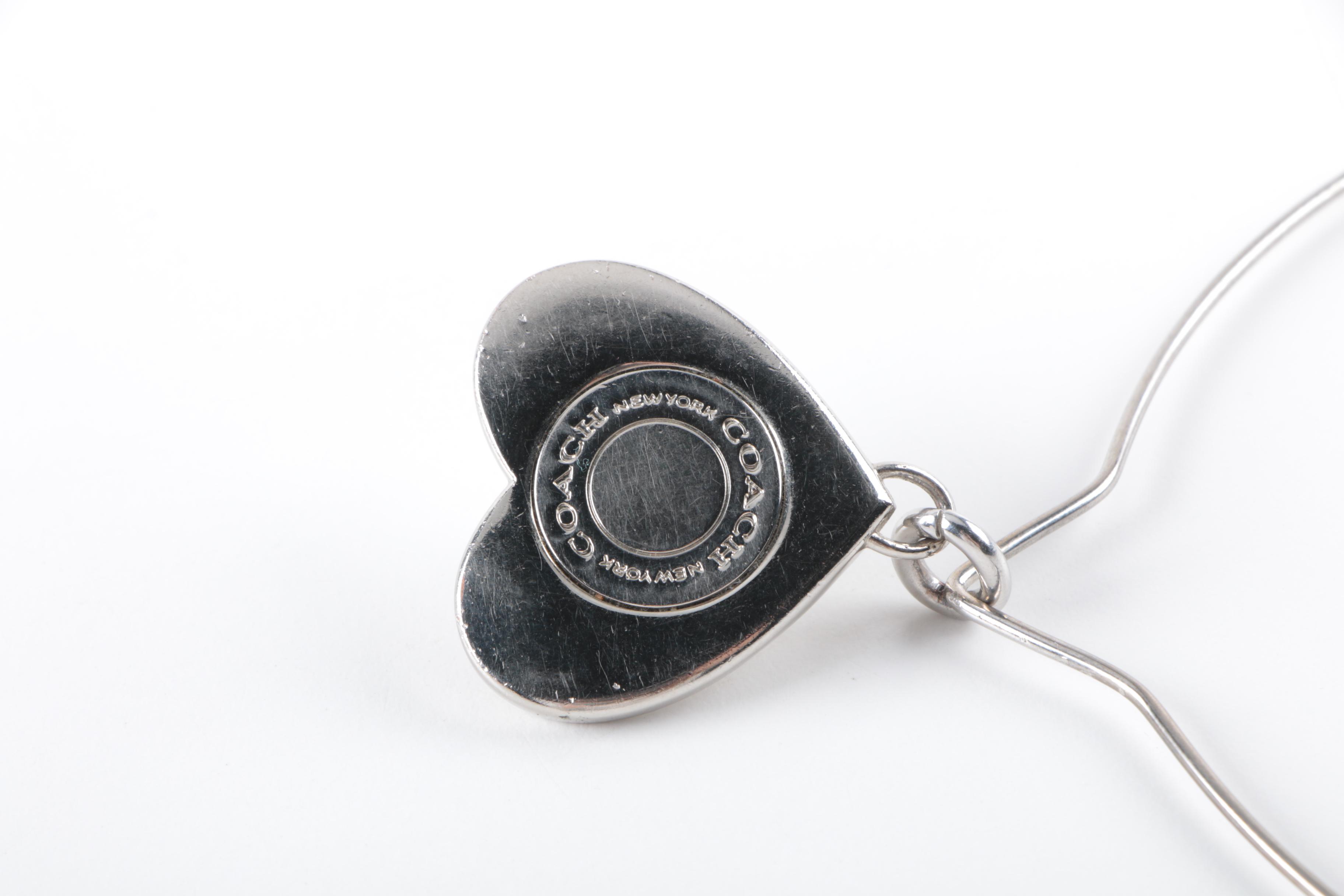 Collection of Costume Jewelry Featuring Coach Necklace and Swarovski Earrings