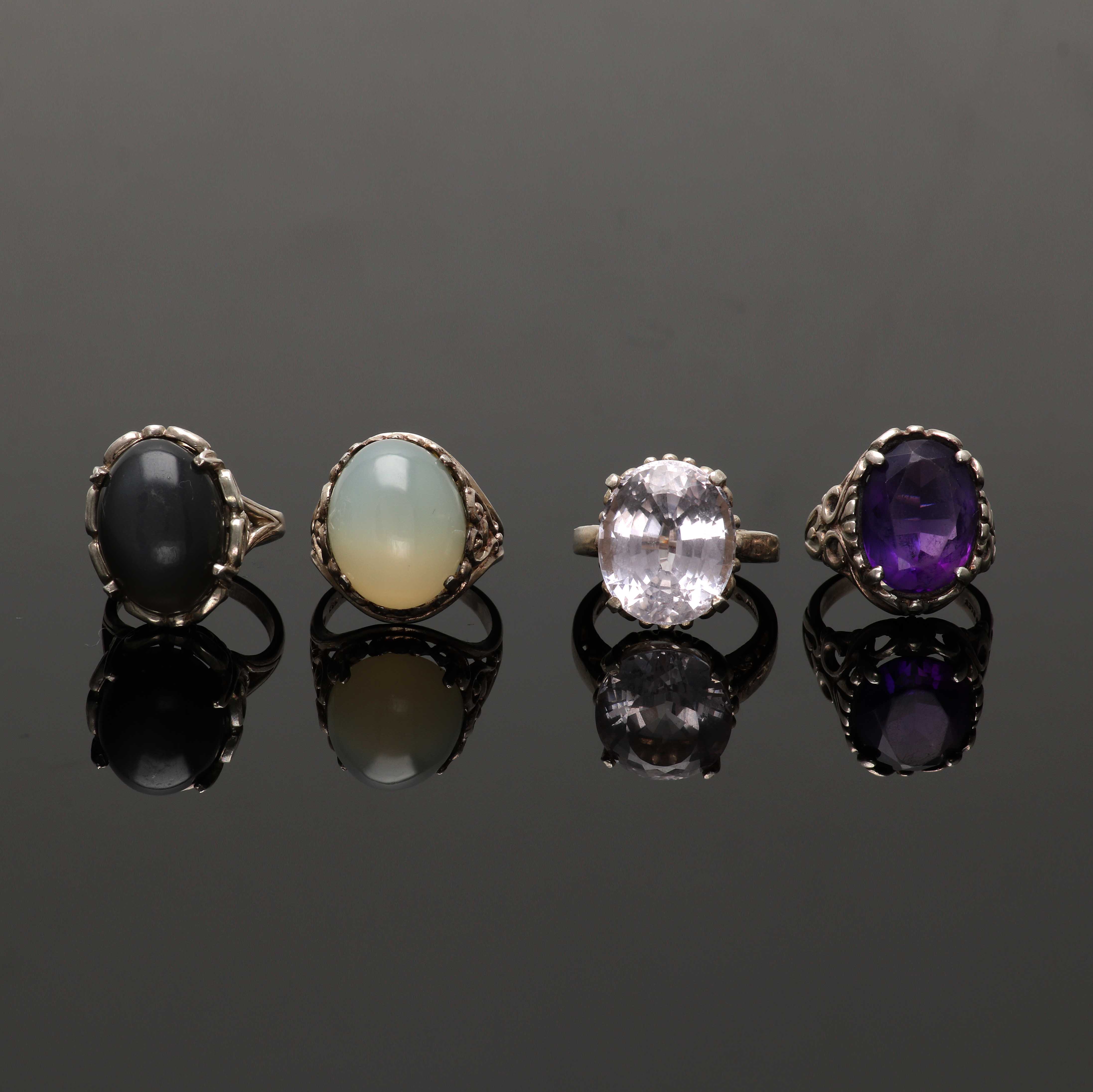 Four Sterling Silver Rings Featuring Amethyst and Moonstone