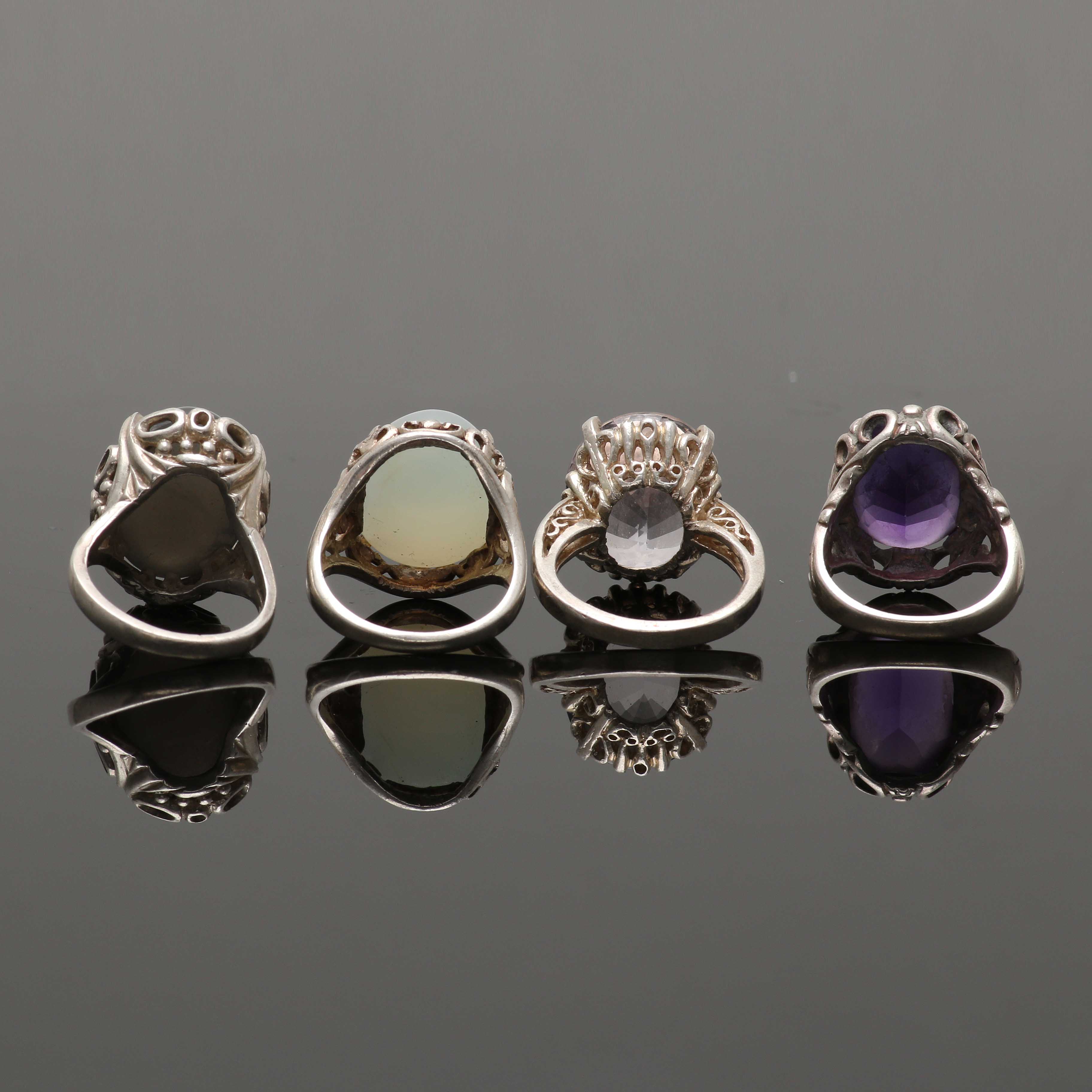 Four Sterling Silver Rings Featuring Amethyst and Moonstone