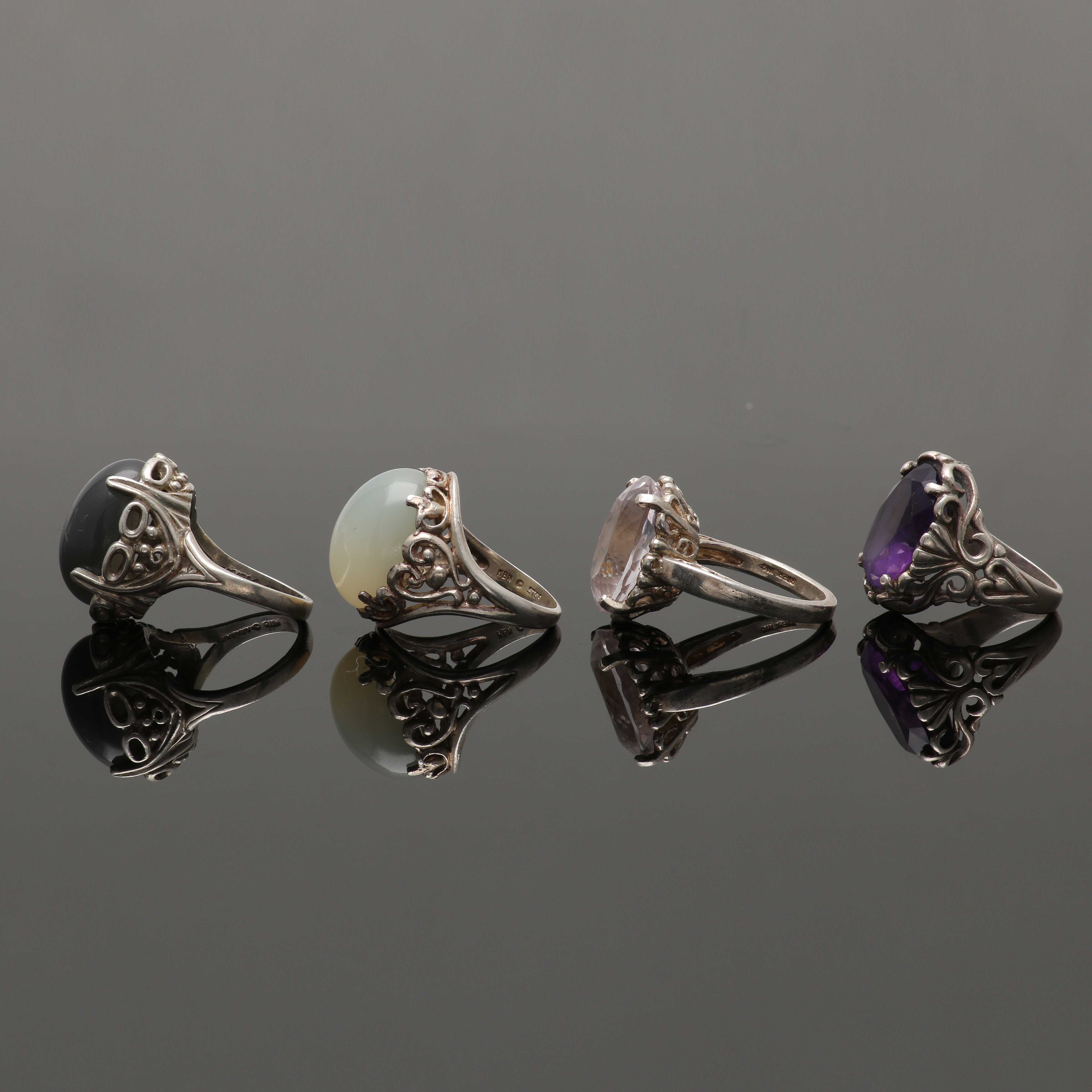 Four Sterling Silver Rings Featuring Amethyst and Moonstone