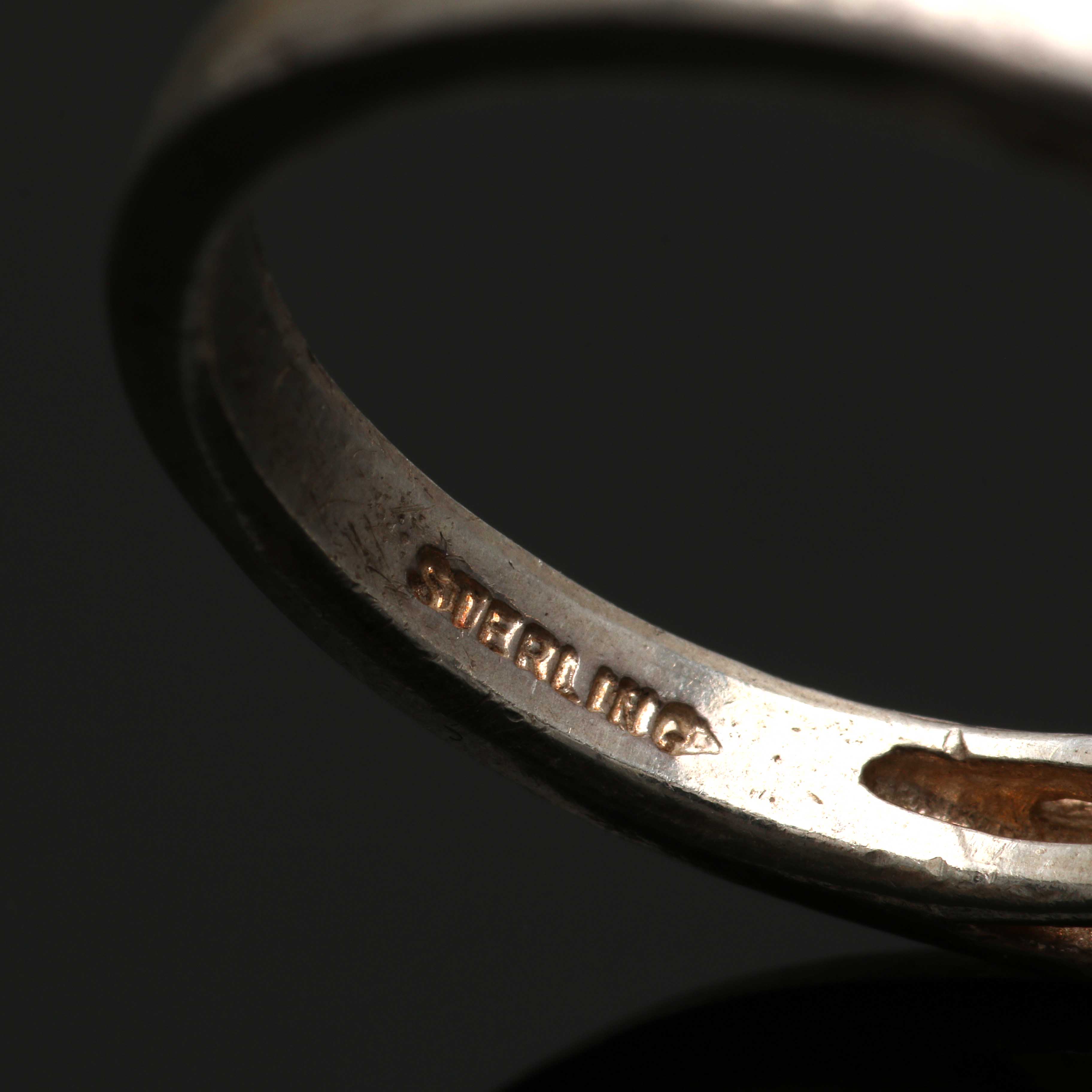 Four Sterling Silver Rings Featuring Amethyst and Moonstone