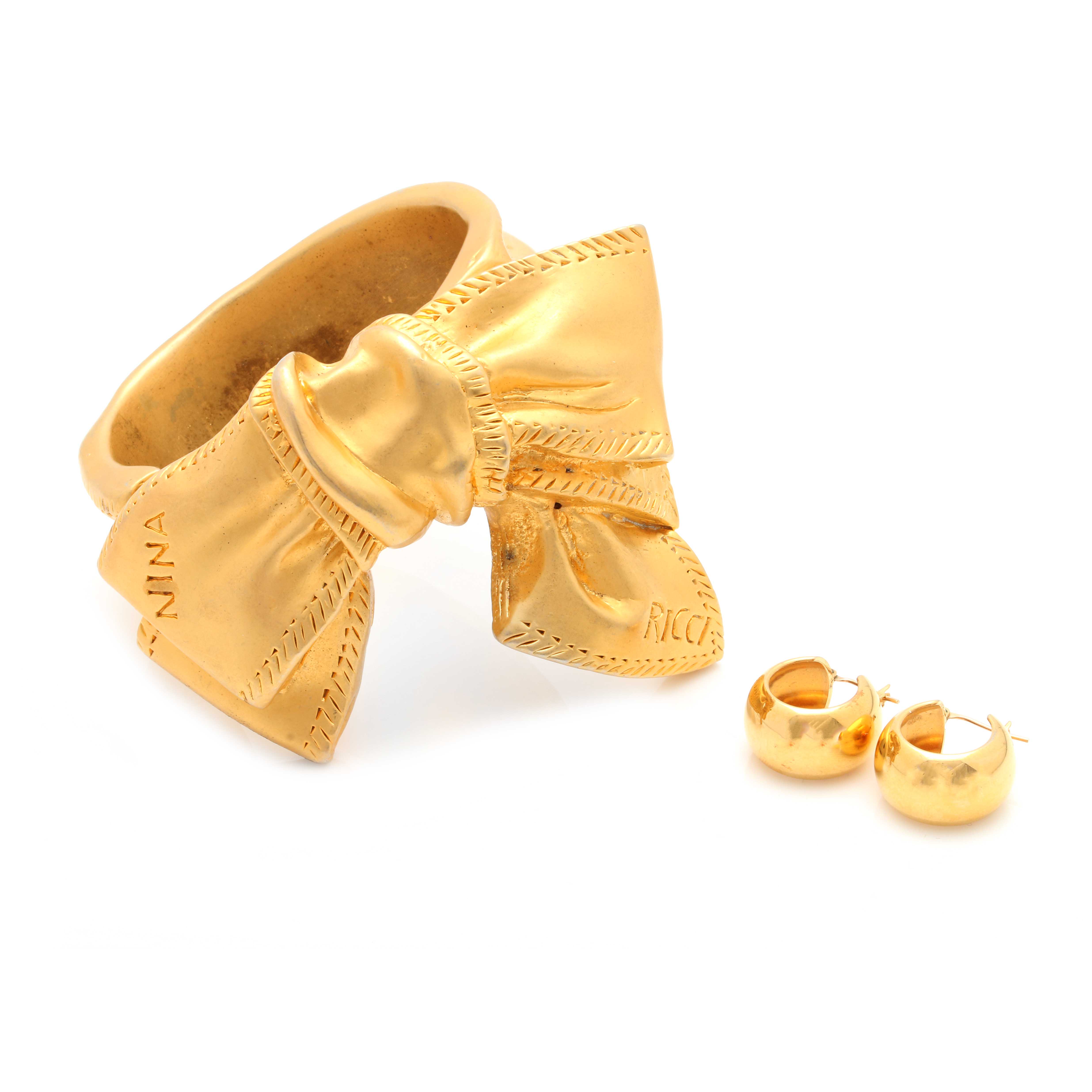 Selection of Nina Ricci Gold Tone Clamper Bracelet and Gold Tone Hoop Earrings