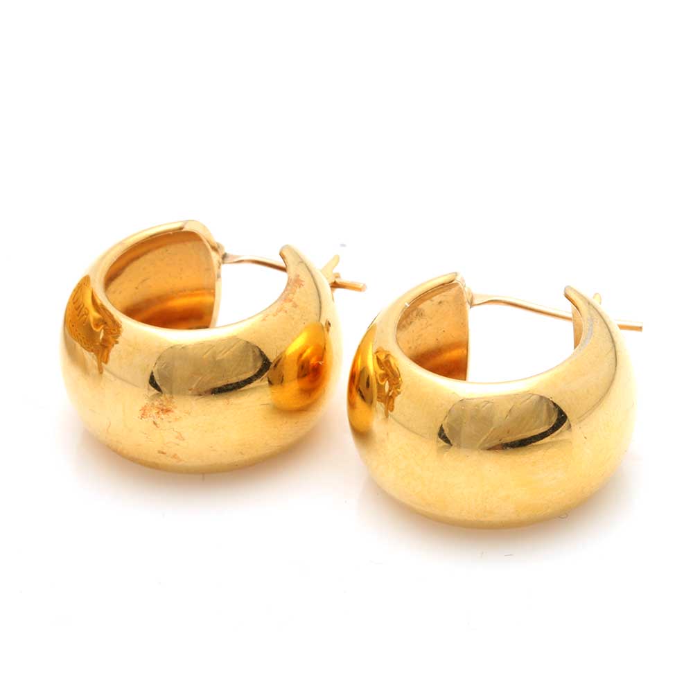 Selection of Nina Ricci Gold Tone Clamper Bracelet and Gold Tone Hoop Earrings