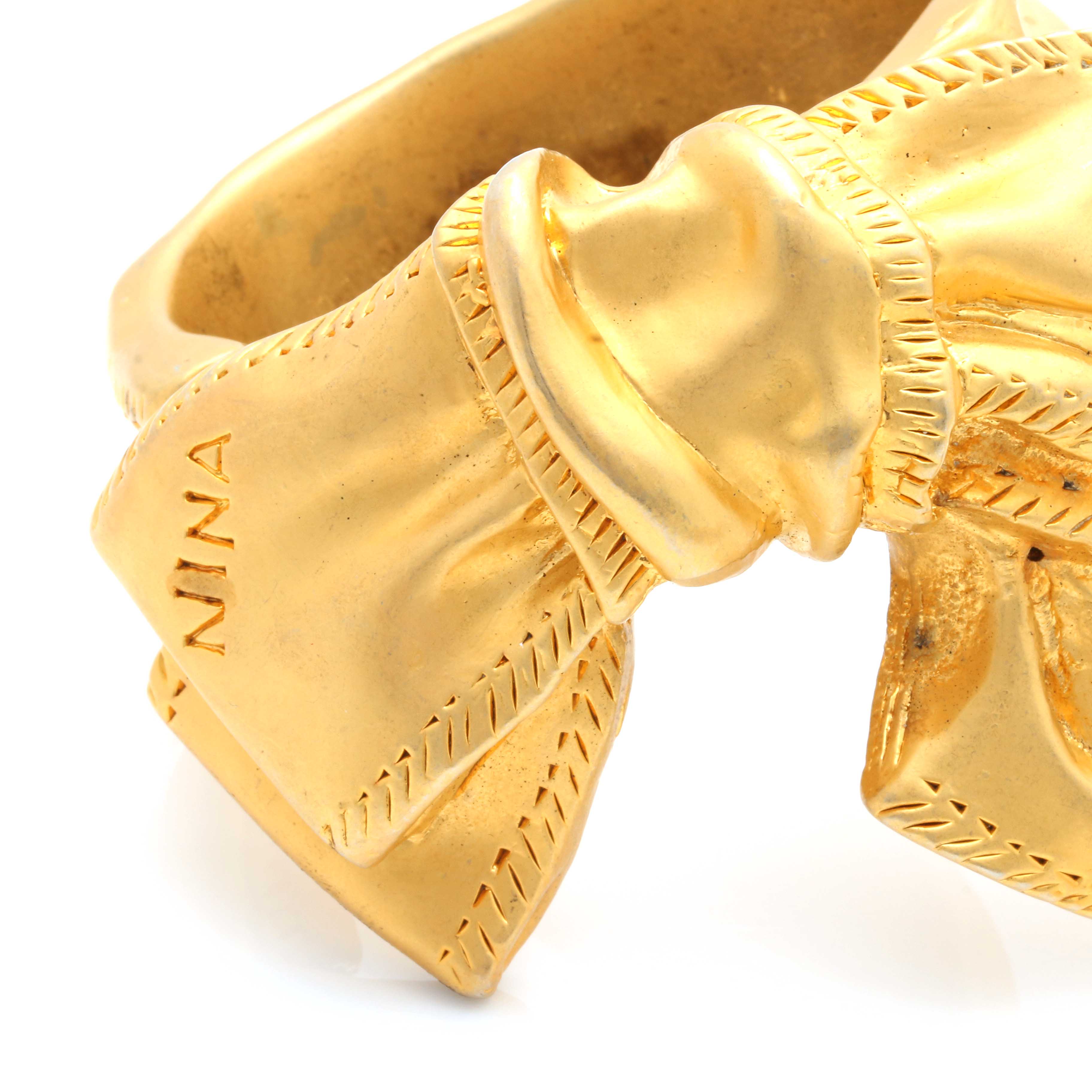 Selection of Nina Ricci Gold Tone Clamper Bracelet and Gold Tone Hoop Earrings