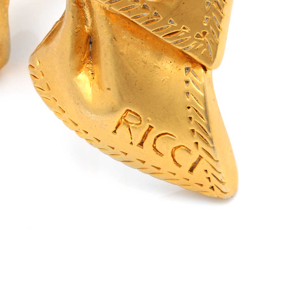 Selection of Nina Ricci Gold Tone Clamper Bracelet and Gold Tone Hoop Earrings