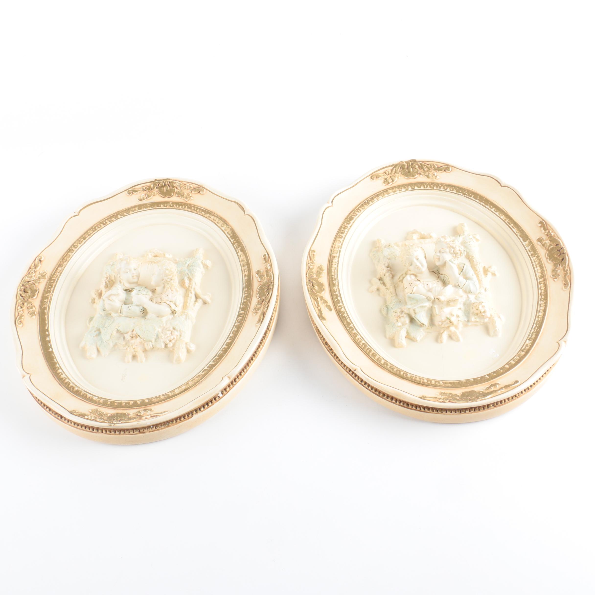 Pair of Vintage Chalkware Wall Hangings with Courtship Scenes in Relief