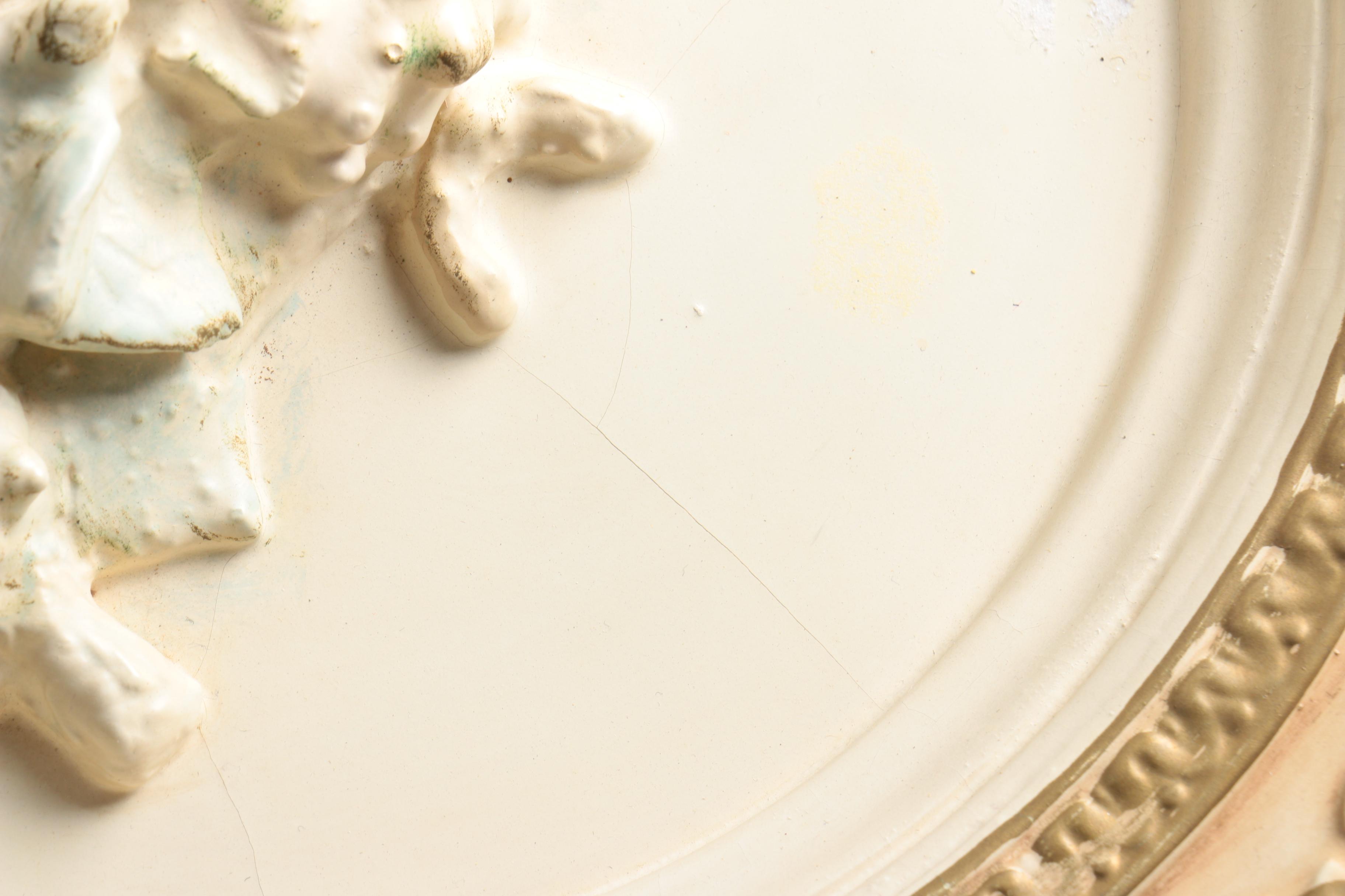 Pair of Vintage Chalkware Wall Hangings with Courtship Scenes in Relief