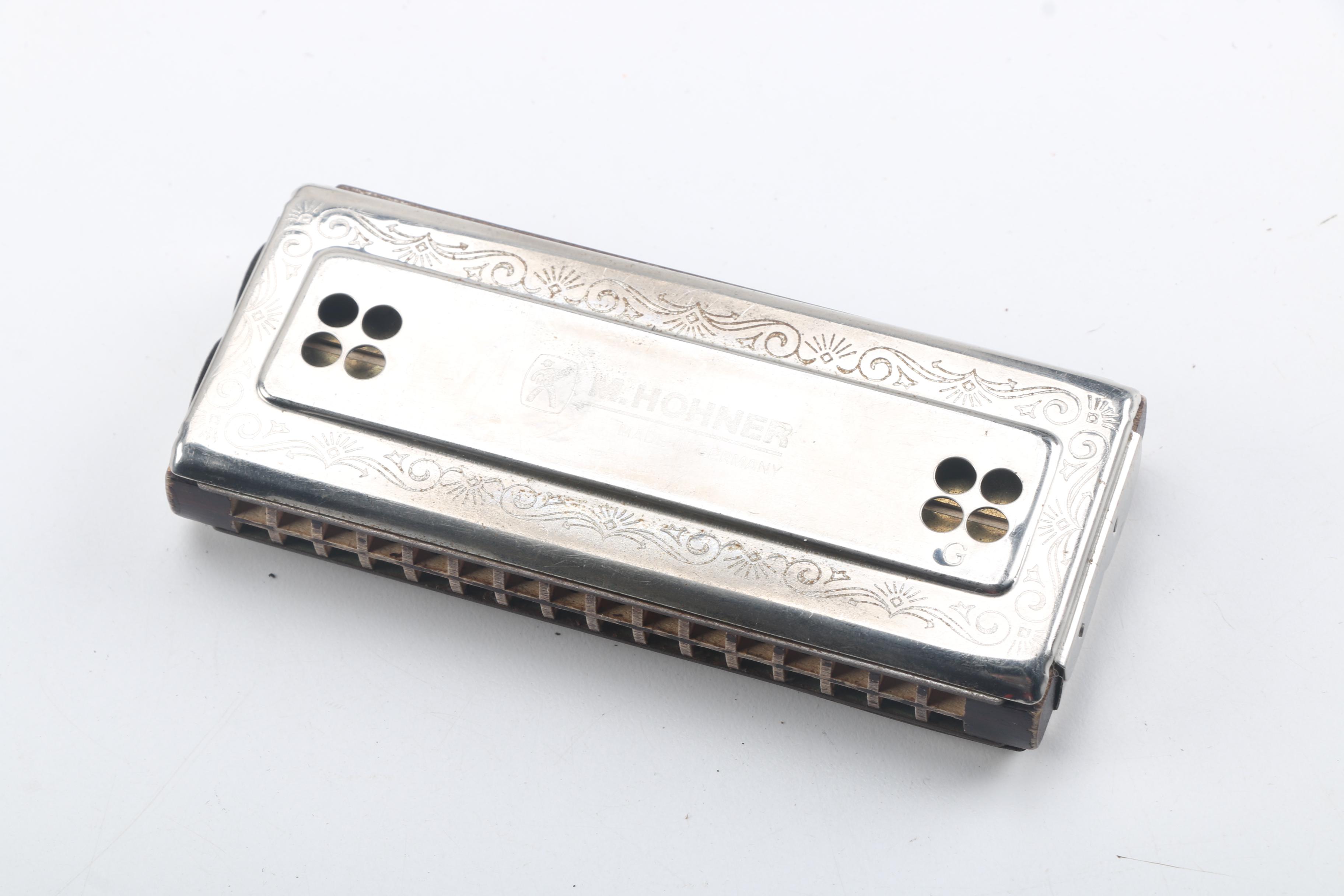 Buescher Aristocrat Flute and Hohner Harmonicas