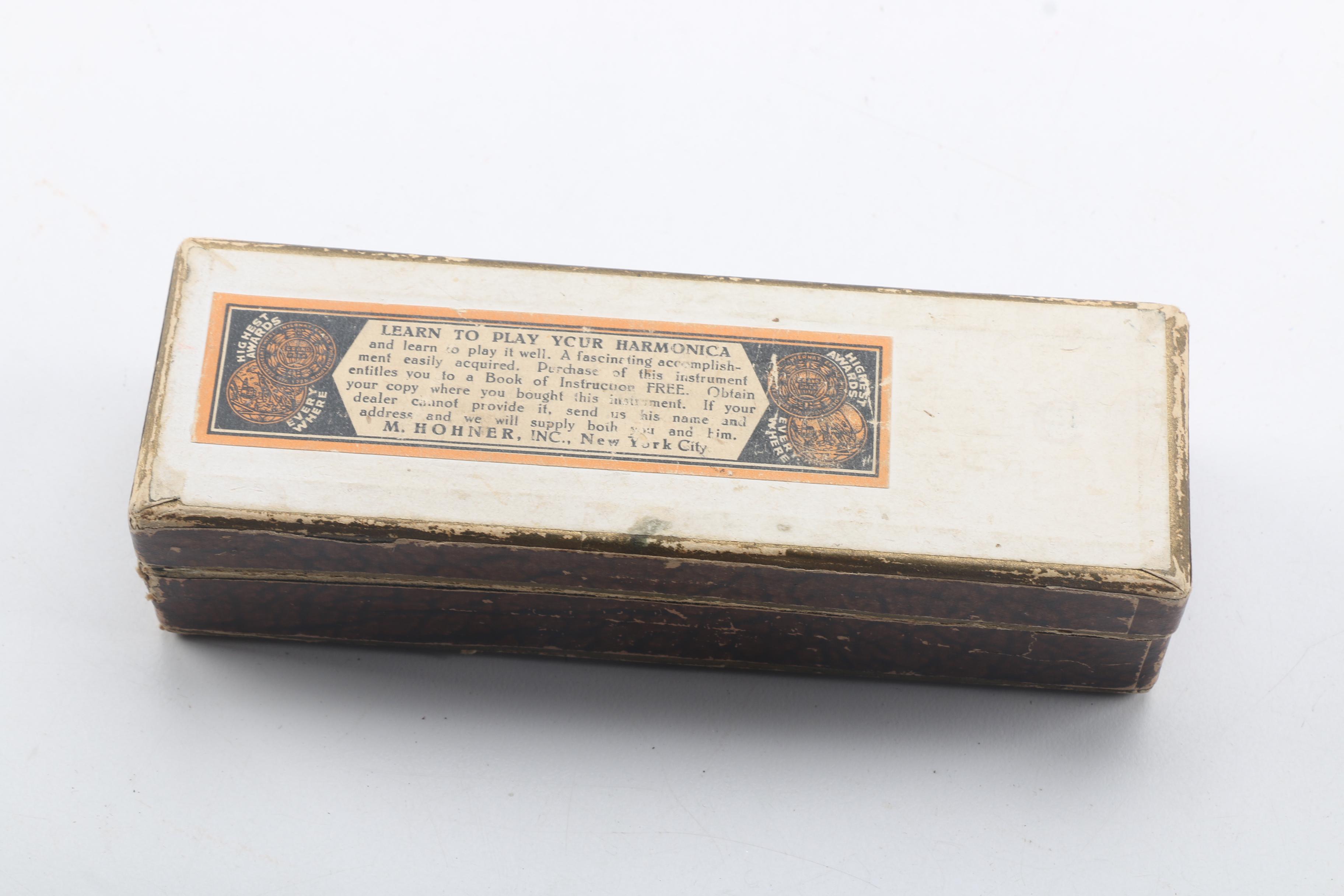 Buescher Aristocrat Flute and Hohner Harmonicas