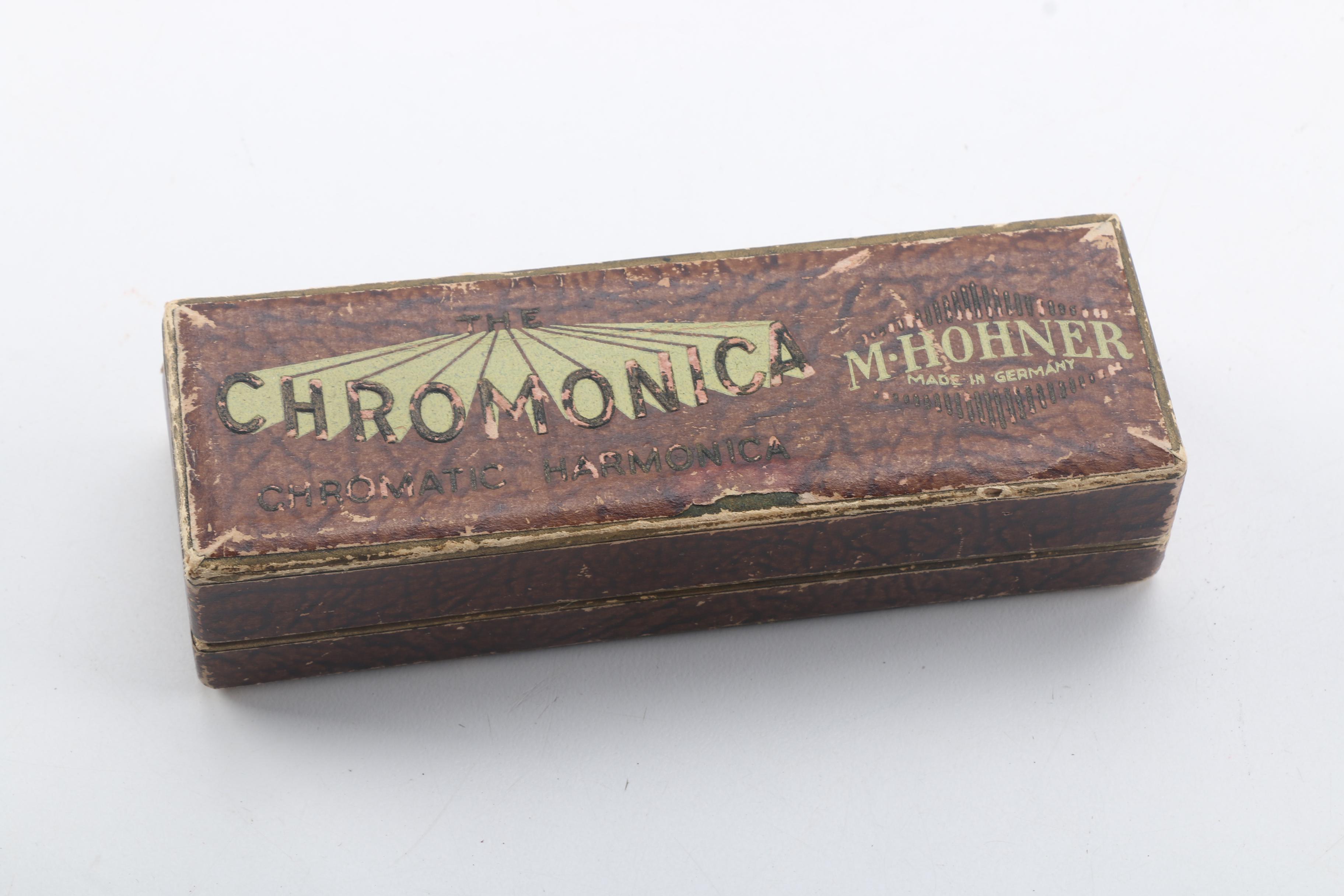 Buescher Aristocrat Flute and Hohner Harmonicas