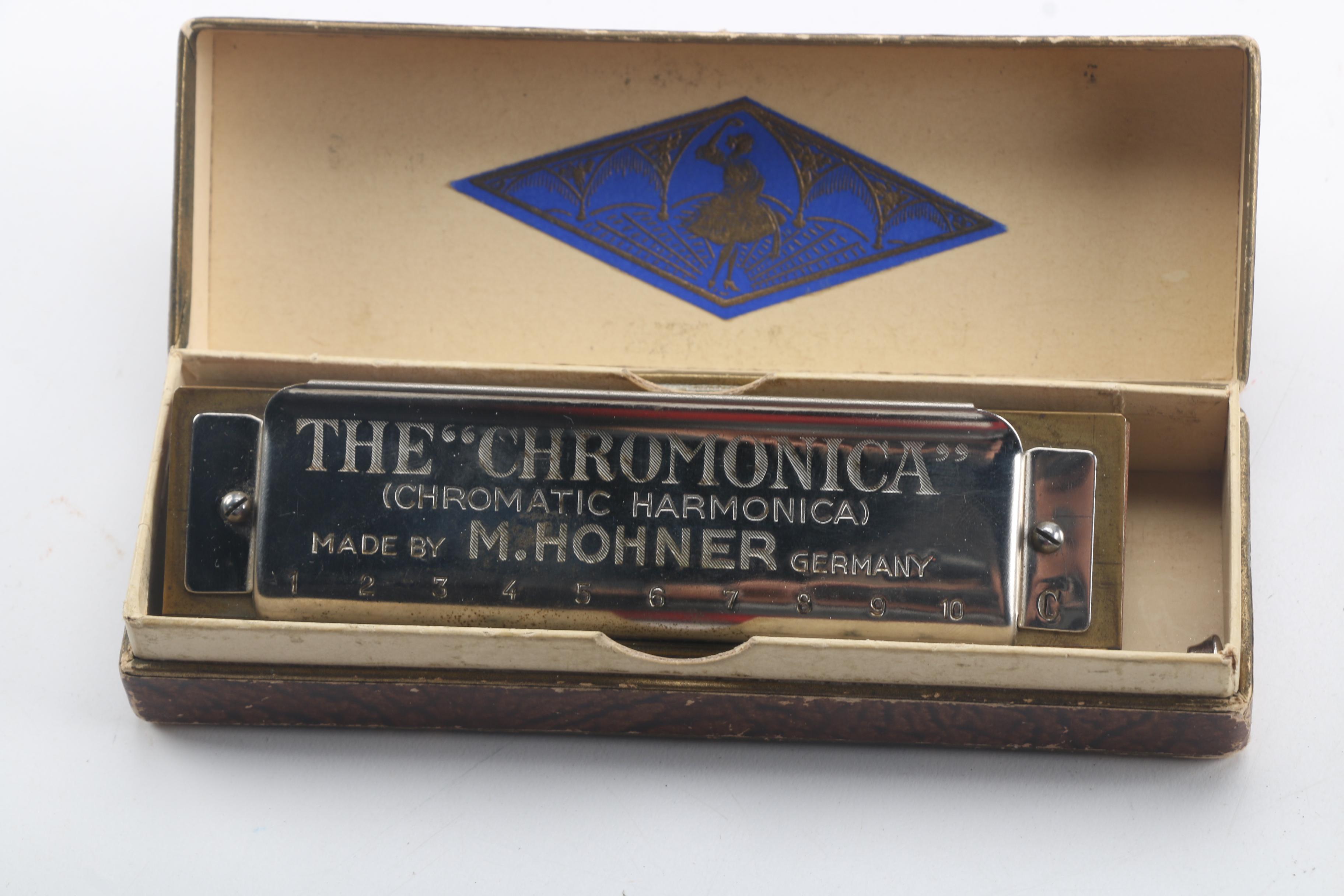 Buescher Aristocrat Flute and Hohner Harmonicas