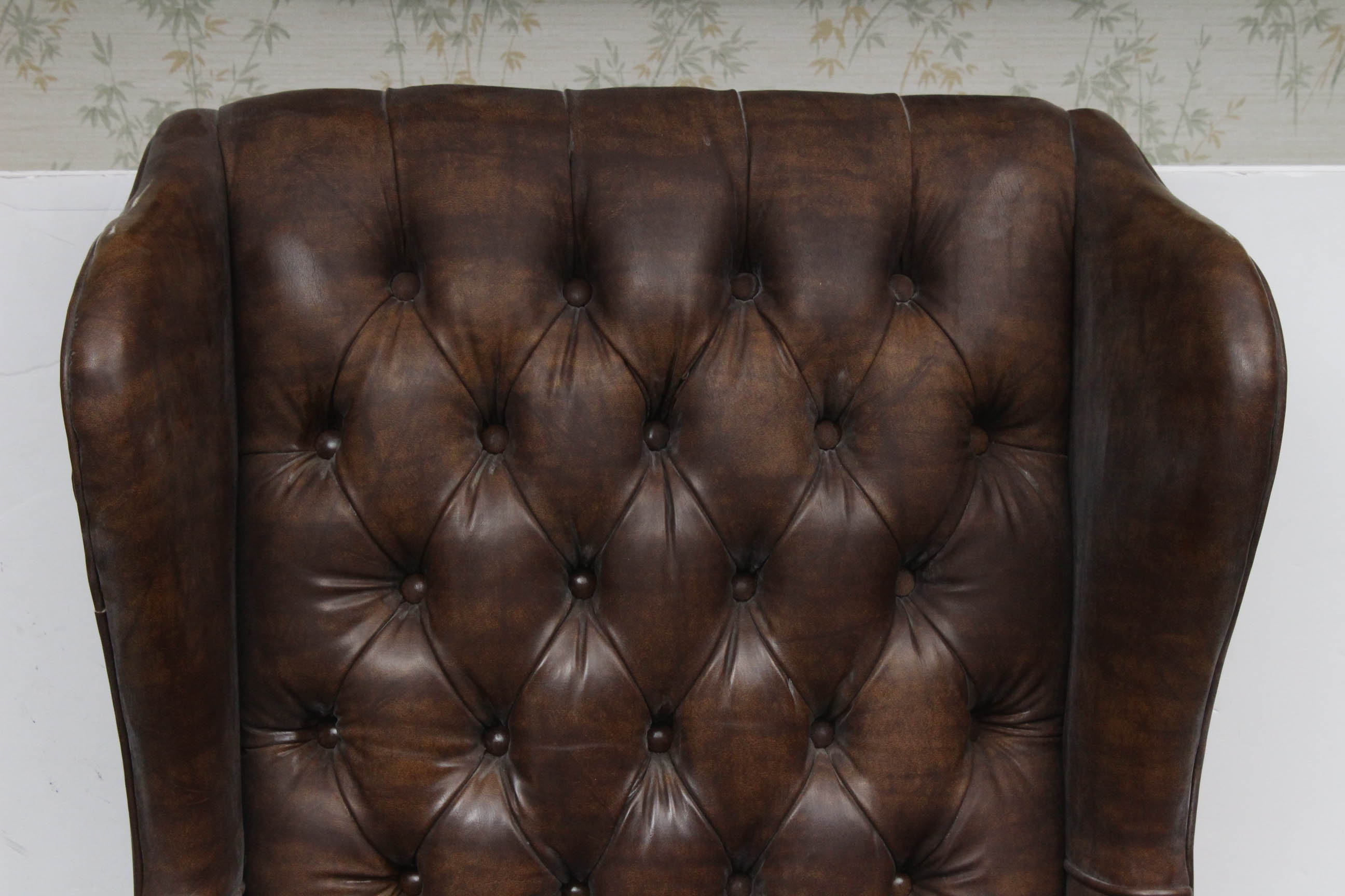 Two Vintage Faux Leather Wing Back Chairs by Sam Moore