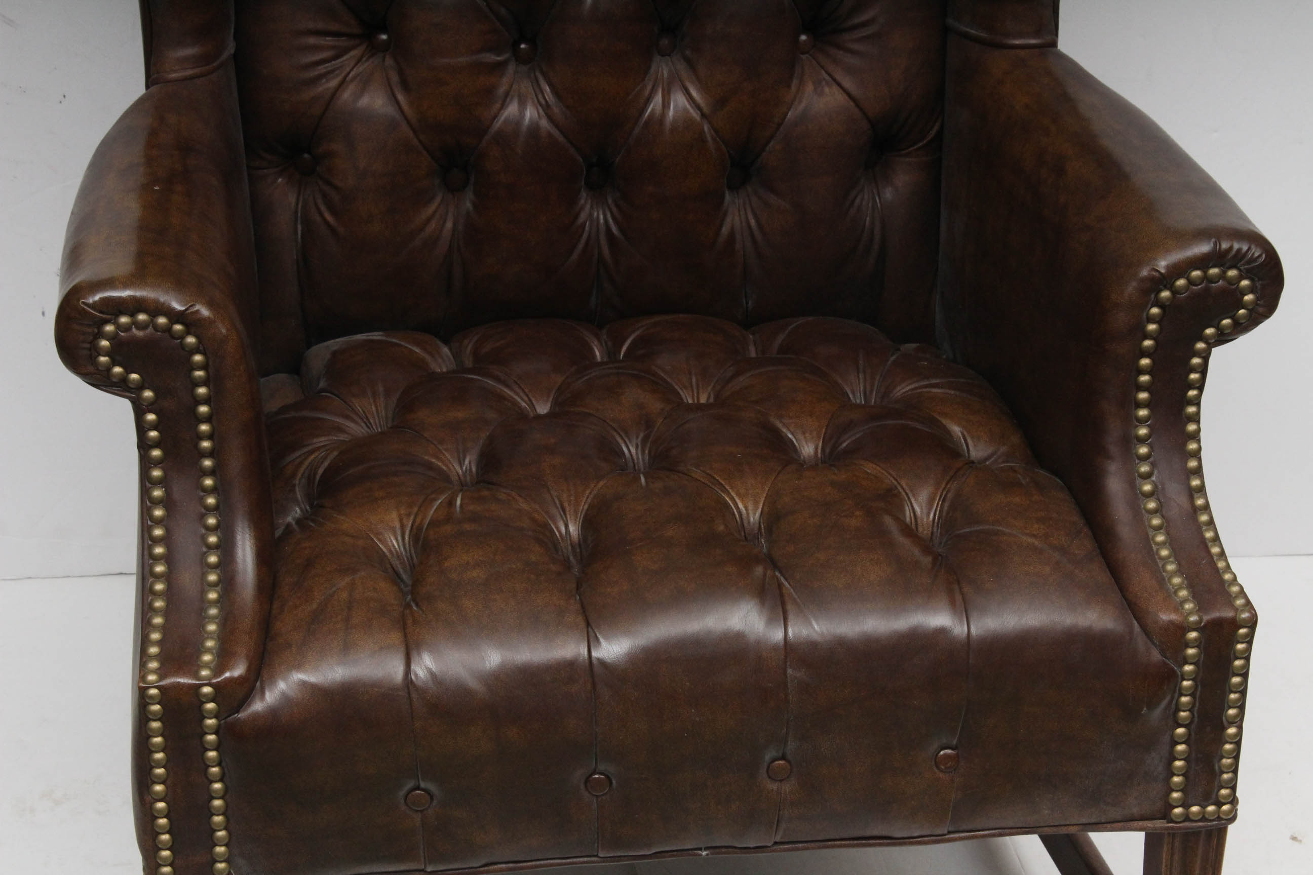 Two Vintage Faux Leather Wing Back Chairs by Sam Moore