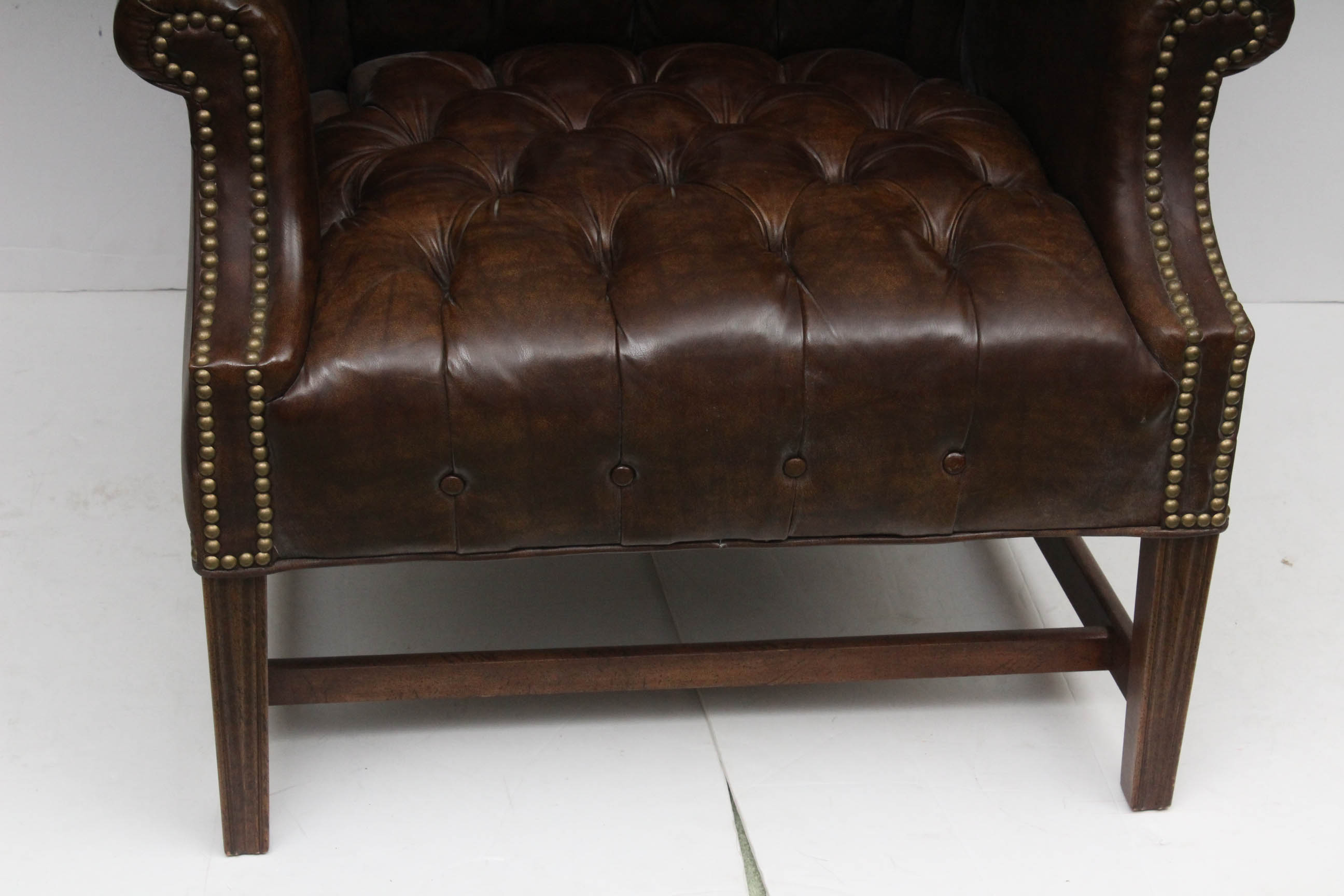 Two Vintage Faux Leather Wing Back Chairs by Sam Moore