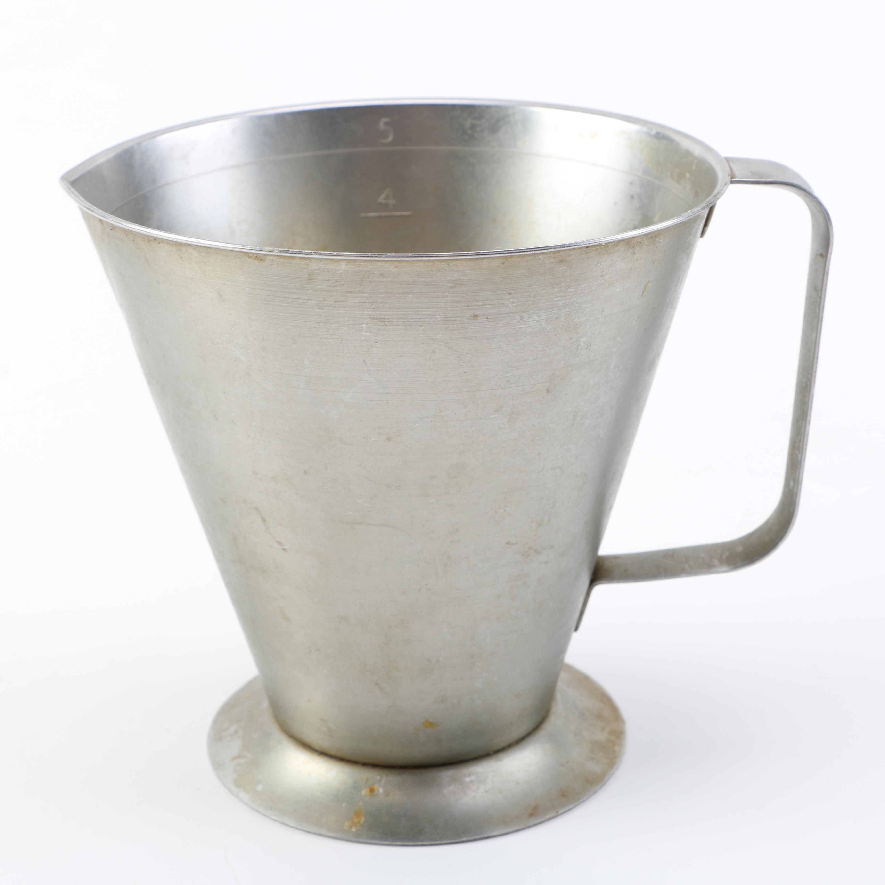 Metal Serving Baskets and Pewter Vessels