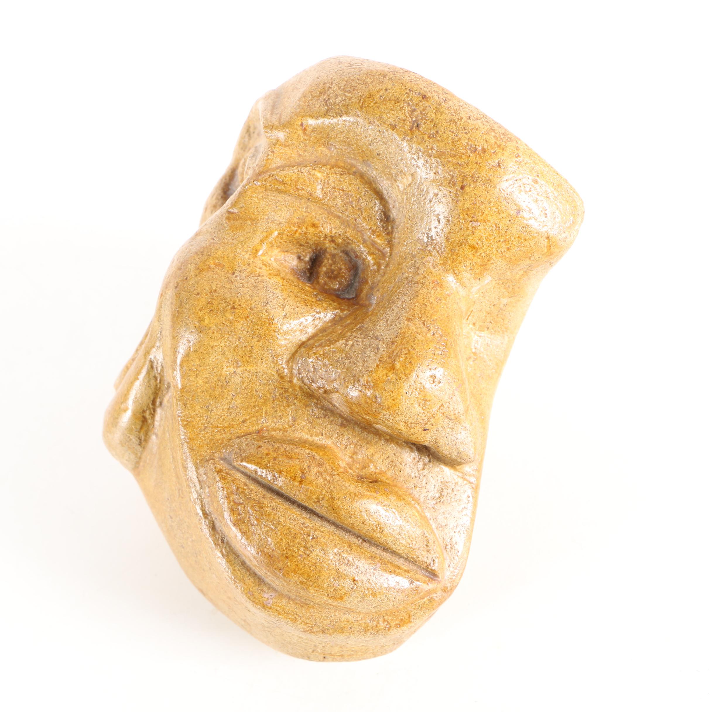 Limestone Sculpture of Stylized Faces