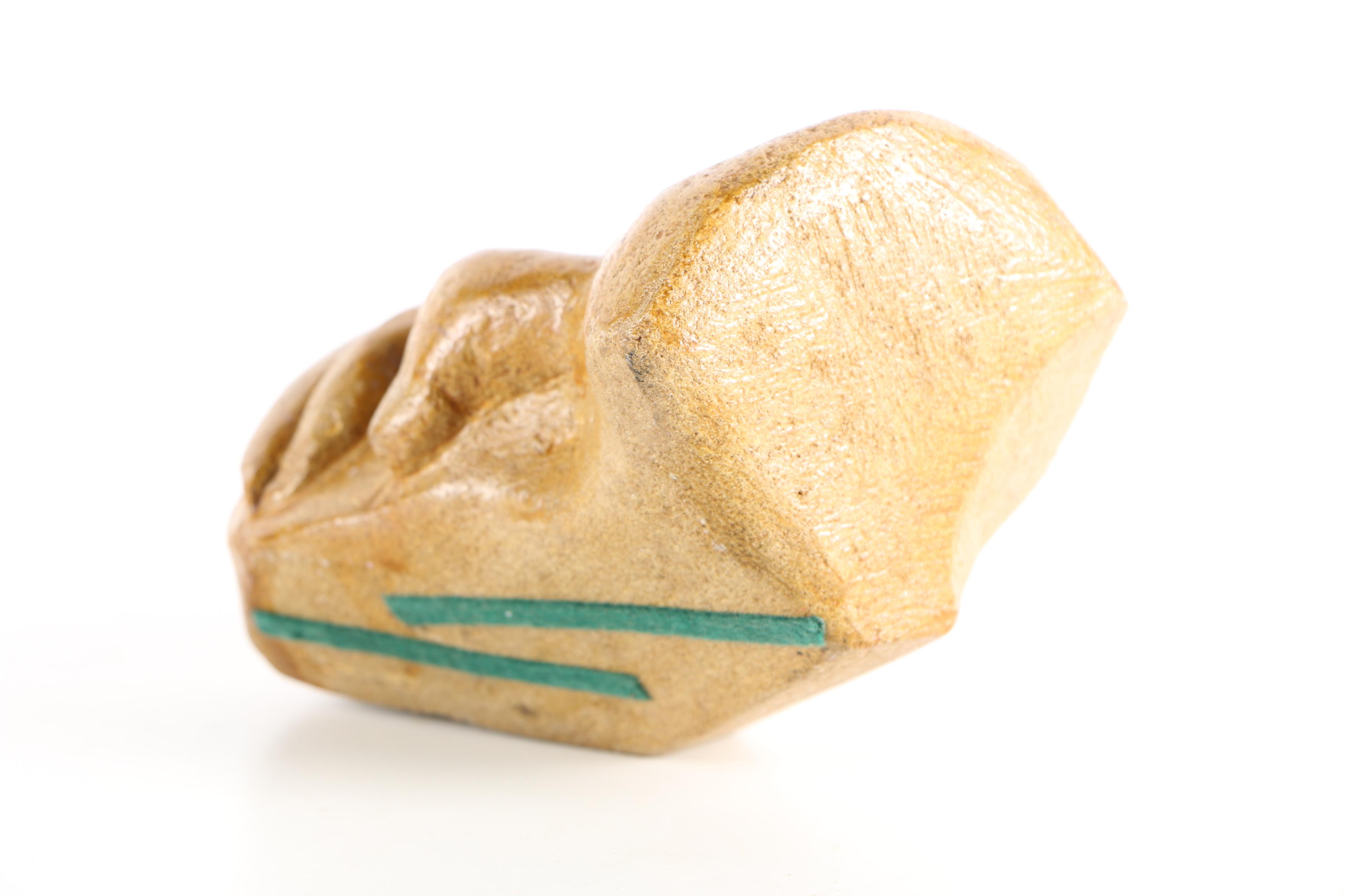 Limestone Sculpture of Stylized Faces