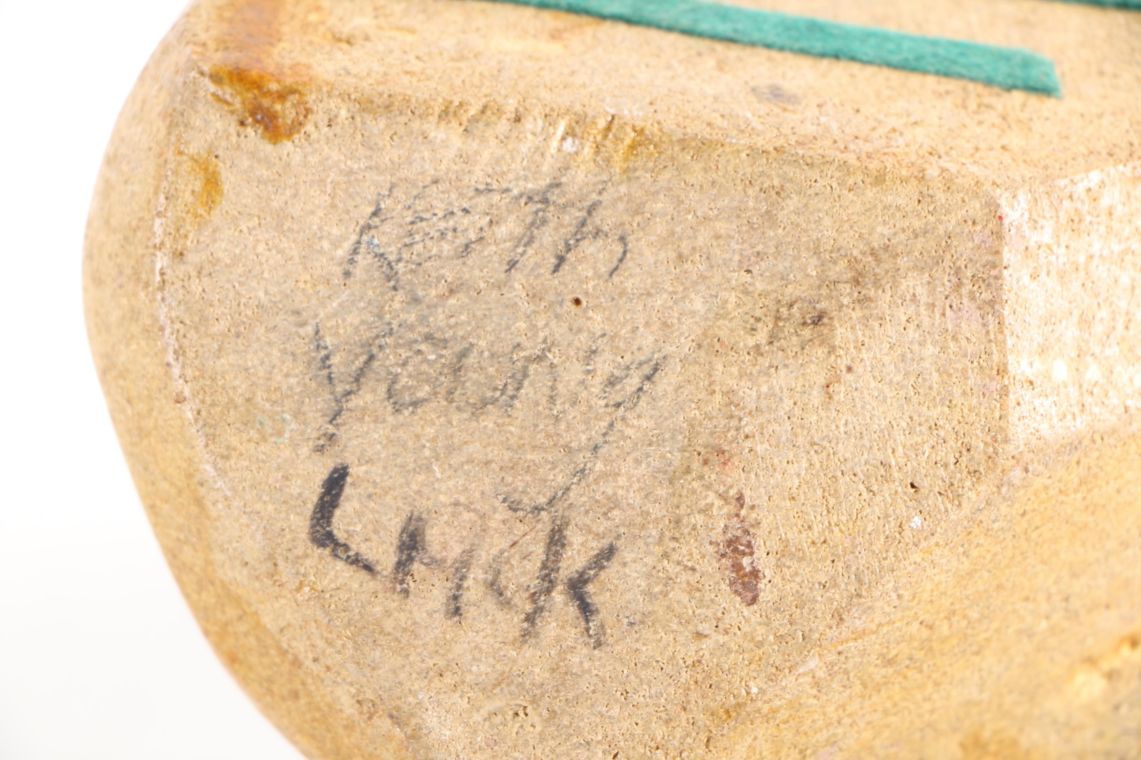 Limestone Sculpture of Stylized Faces