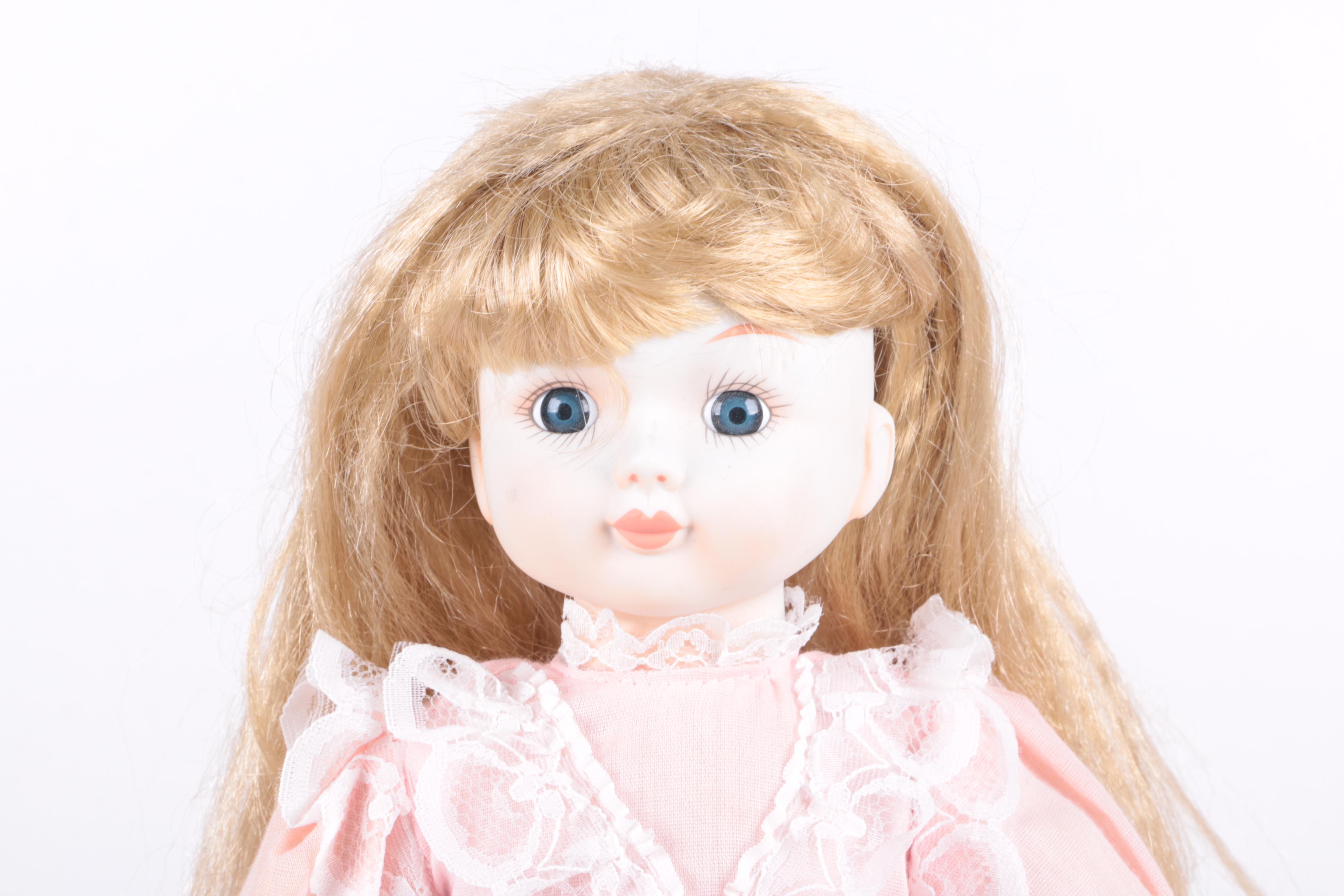 Vintage Blonde Porcelain Doll in Peach Dress