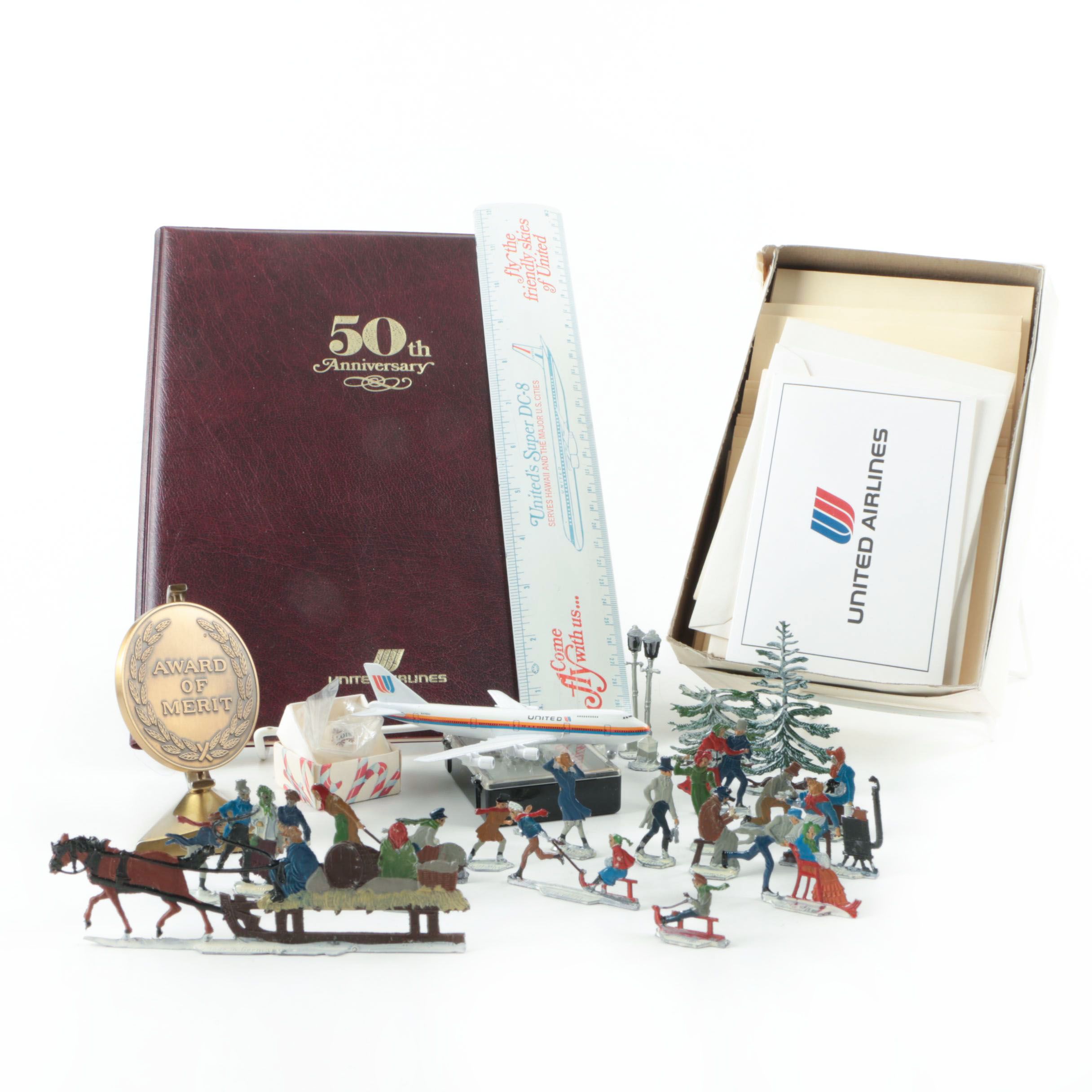 Vintage German Skating and Sleigh Ride Figurines and United Airlines Memorabilia