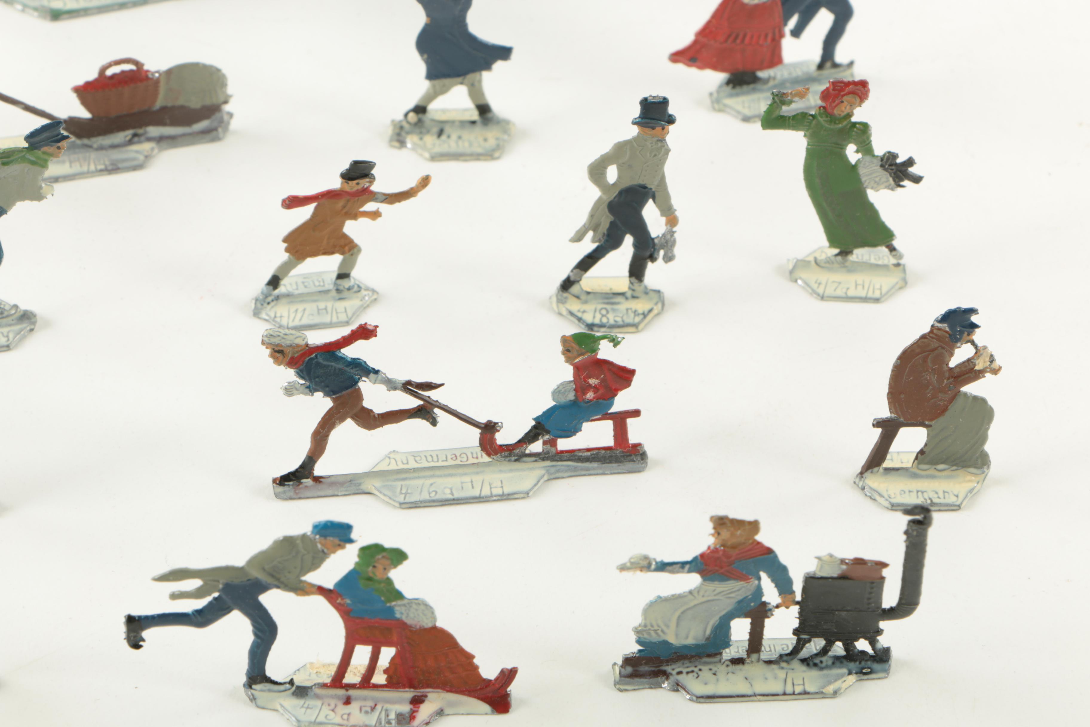 Vintage German Skating and Sleigh Ride Figurines and United Airlines Memorabilia