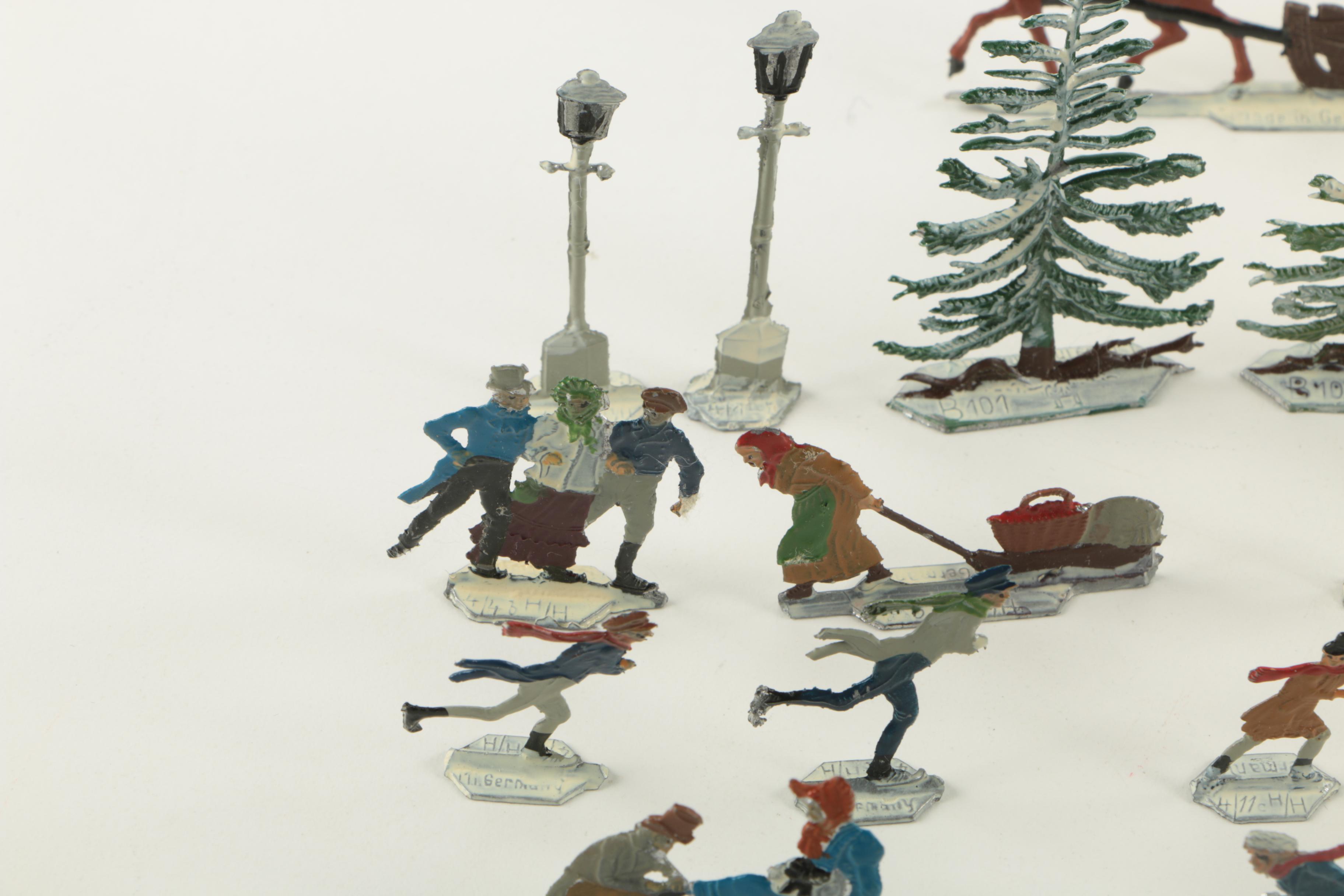 Vintage German Skating and Sleigh Ride Figurines and United Airlines Memorabilia