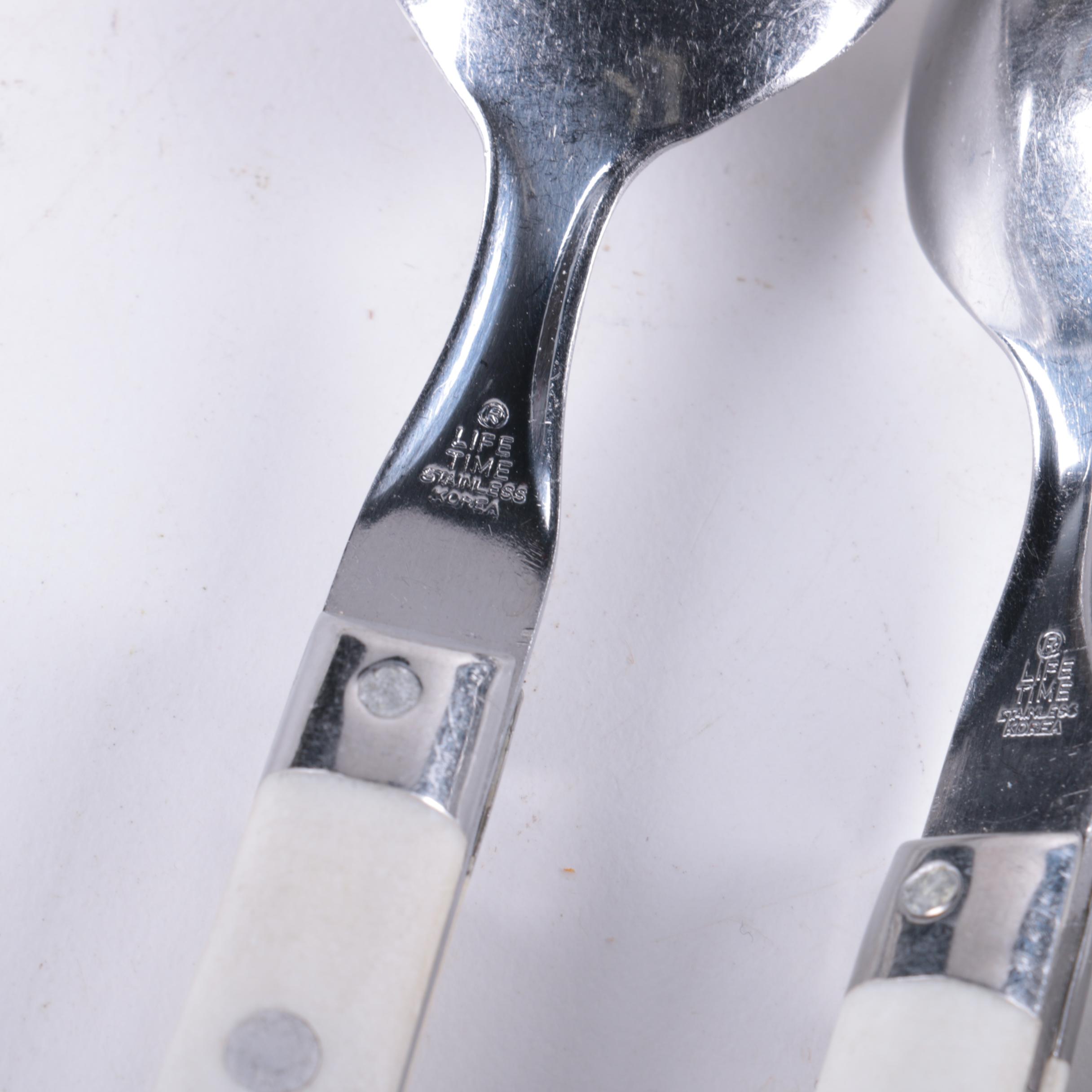 White Plastic Handled Stainless Flatware