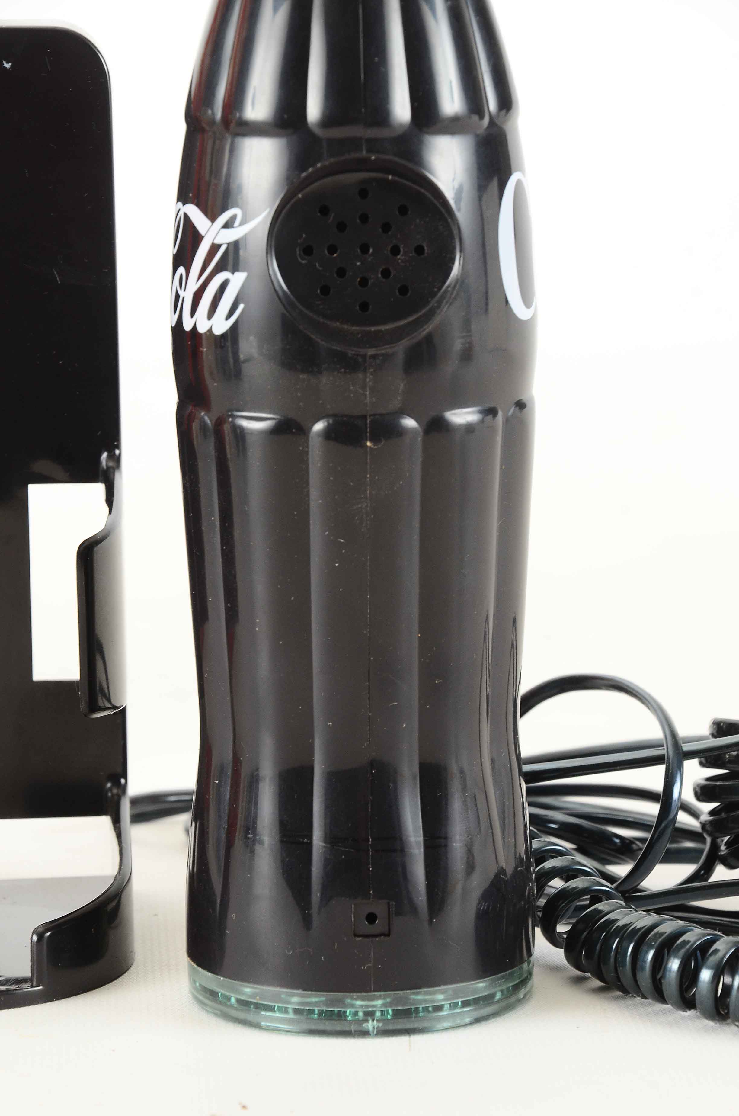 Coke Phone, Flashlight, Radio and An Umbrella