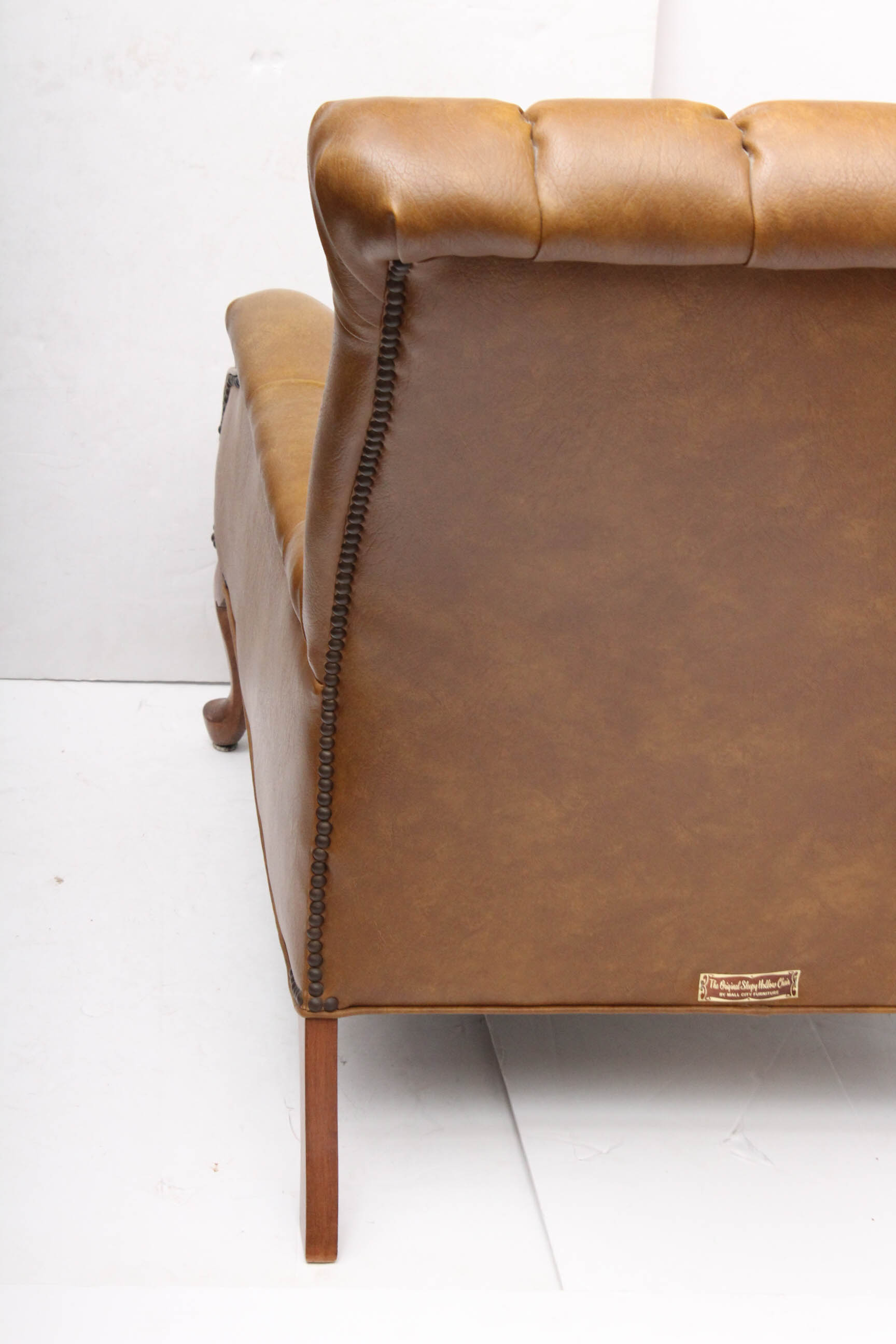 Vintage Sleepy Hollow Chair with Ottoman by Mall City Furniture