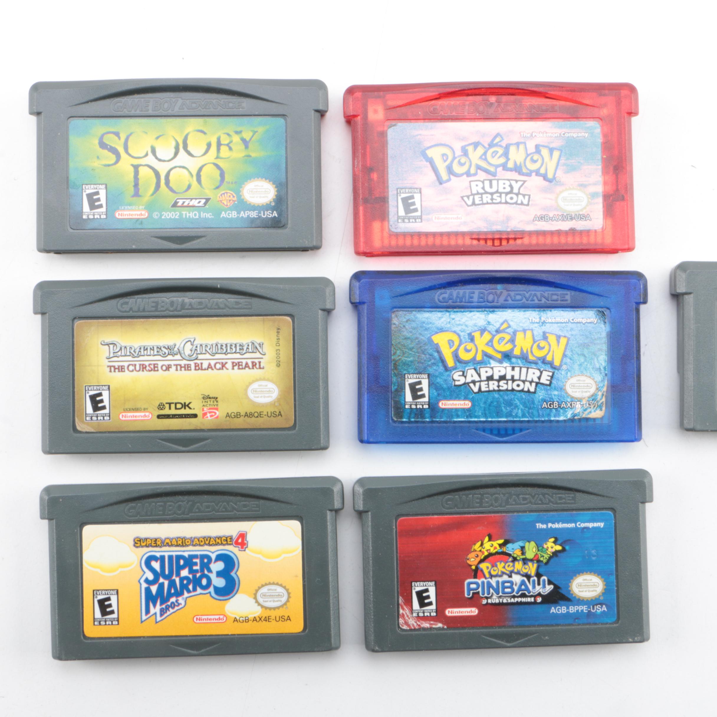 Game Boy Advance SP, Games and Case Featuring Pokémon Ruby and Sapphire