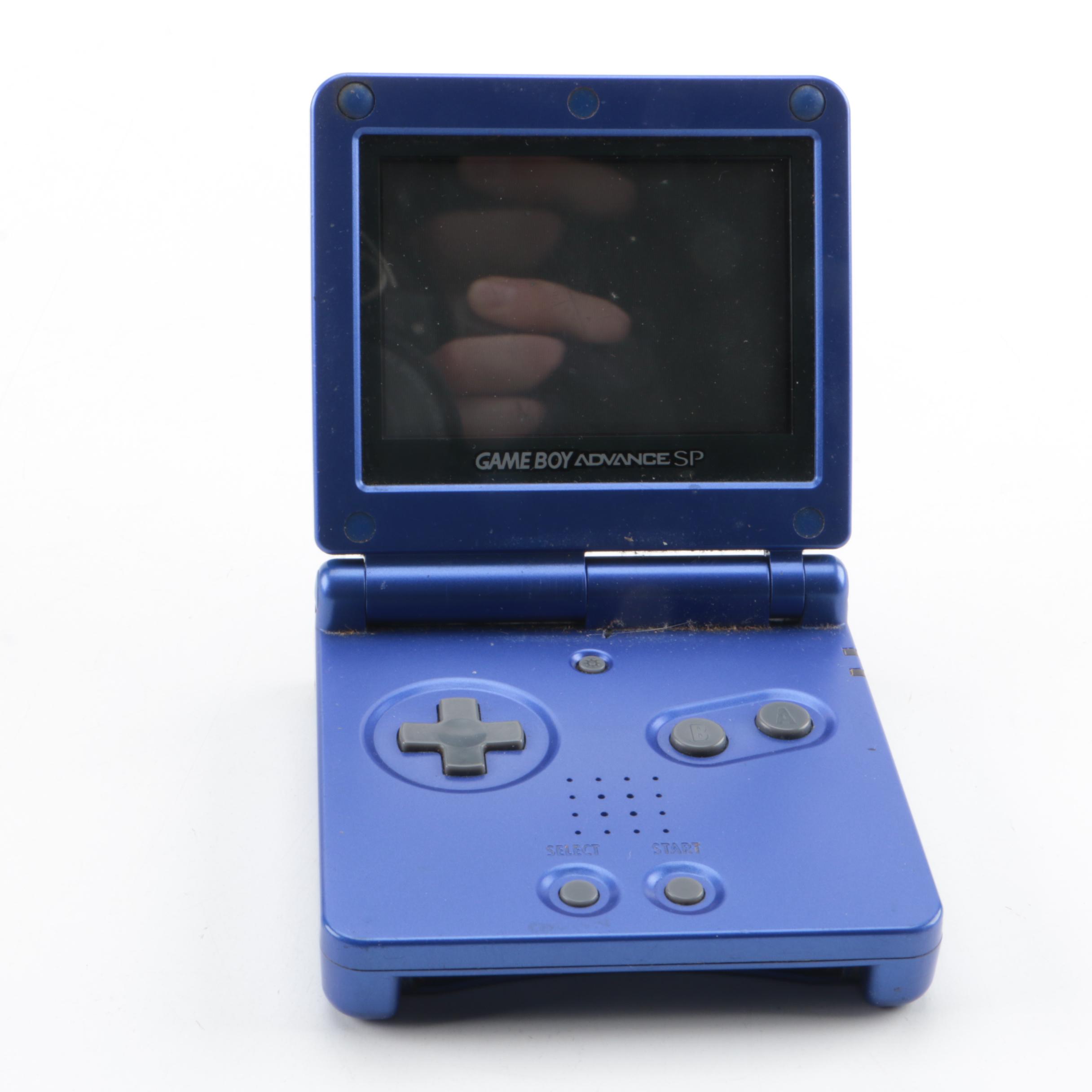 Game Boy Advance SP, Games and Case Featuring Pokémon Ruby and Sapphire