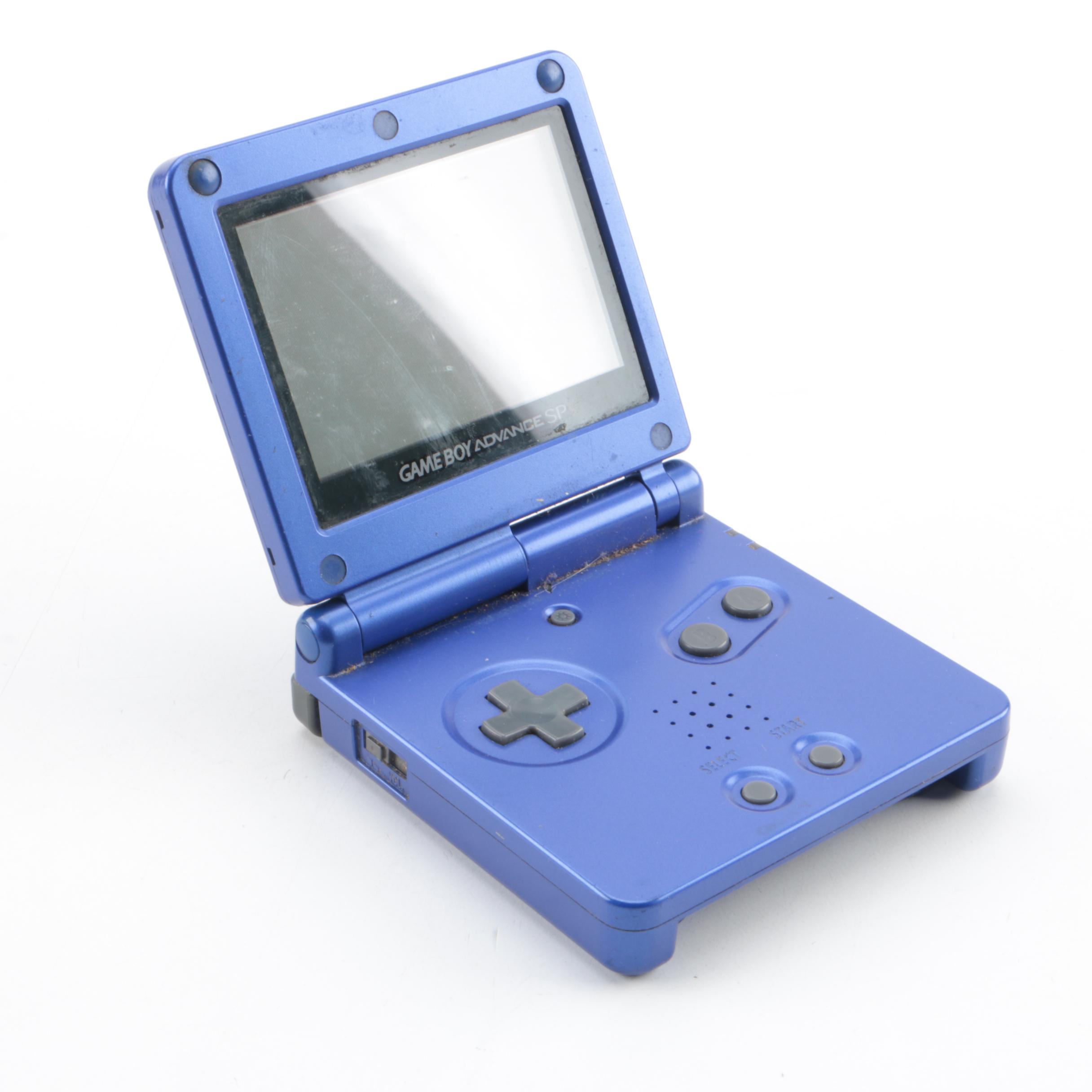 Game Boy Advance SP, Games and Case Featuring Pokémon Ruby and Sapphire