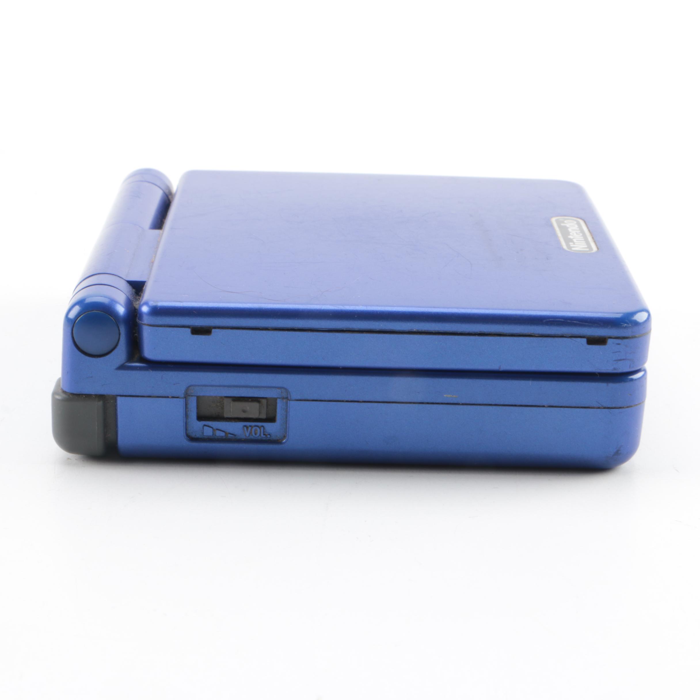 Game Boy Advance SP, Games and Case Featuring Pokémon Ruby and Sapphire