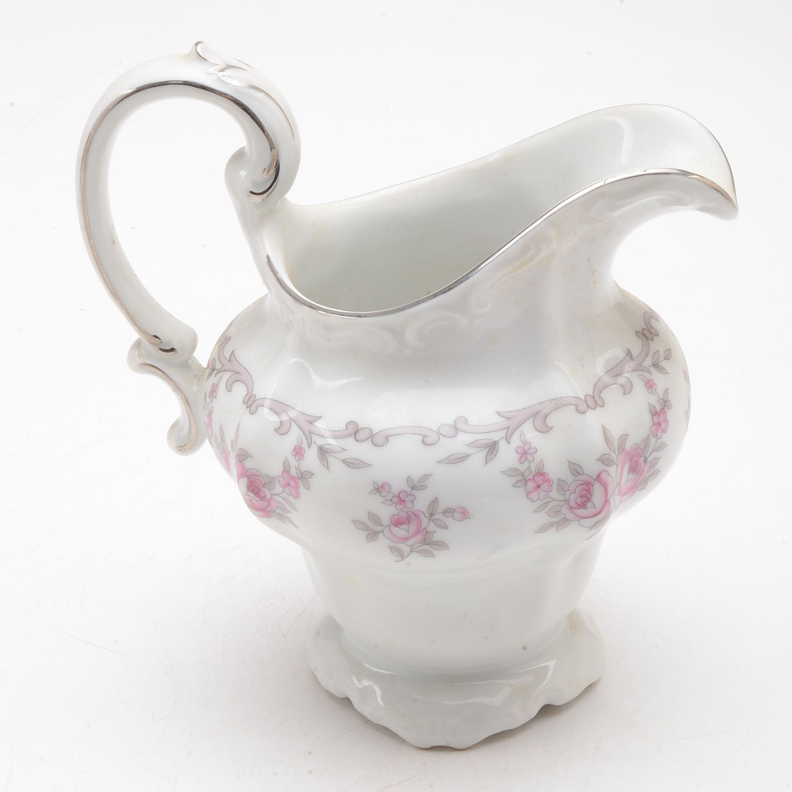 Collection of Porcelain Pitchers and More